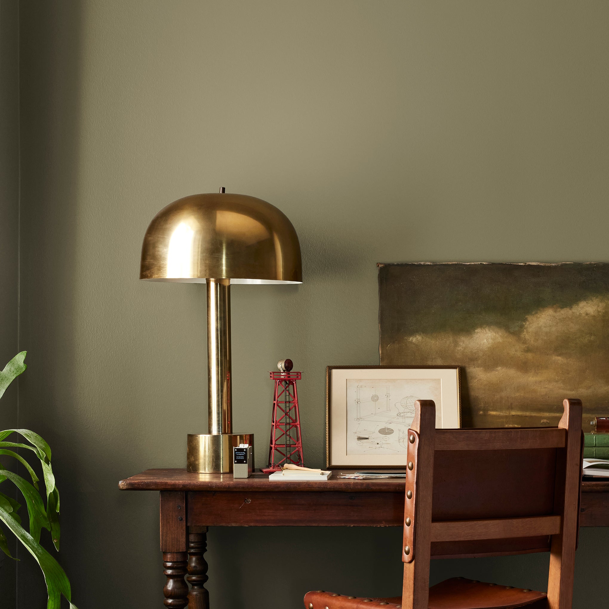 Asparagus green with hazel hues interior paint named landscape shown painted on bedroom wall