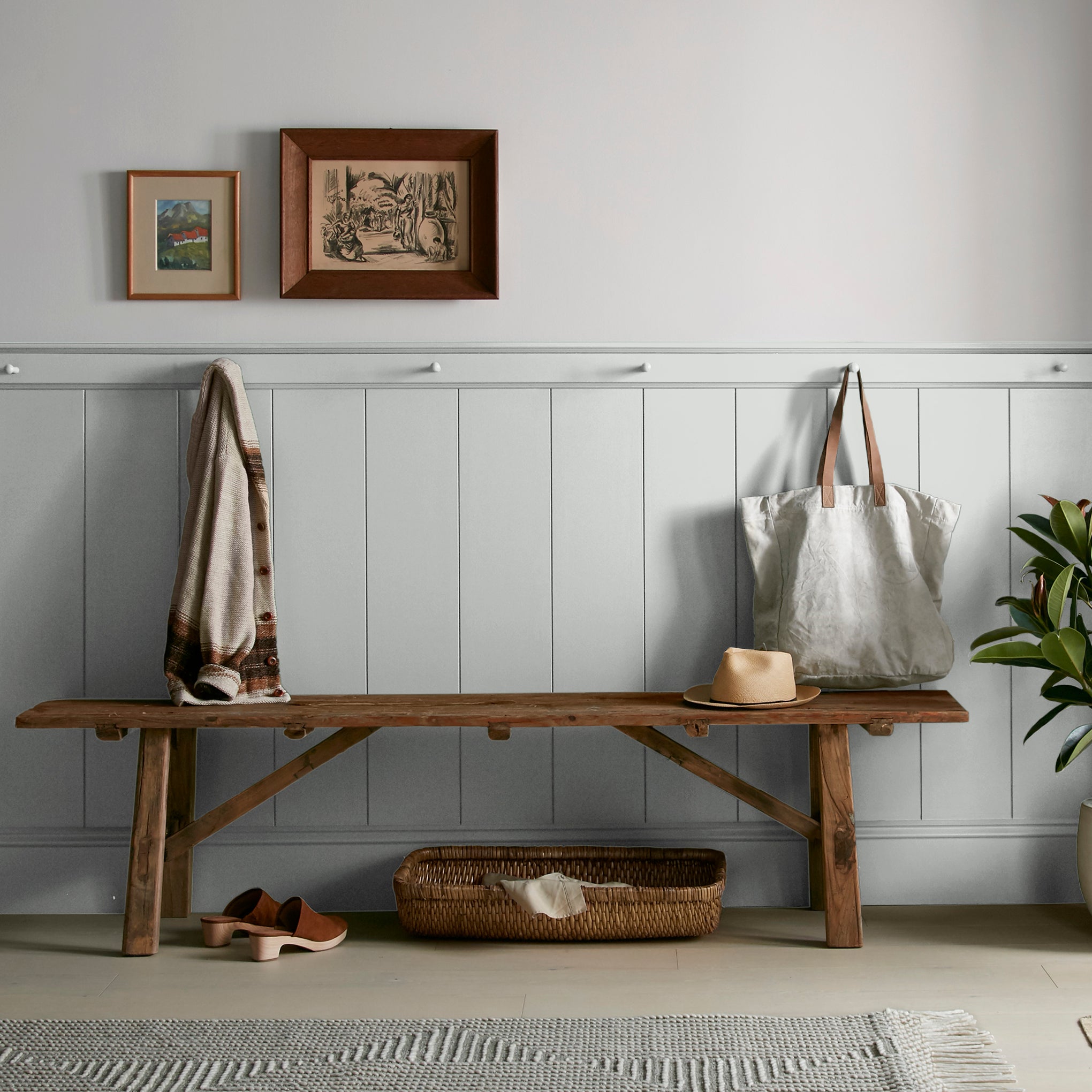 light grey-blue paint named dark moon shown painted on entryway wall