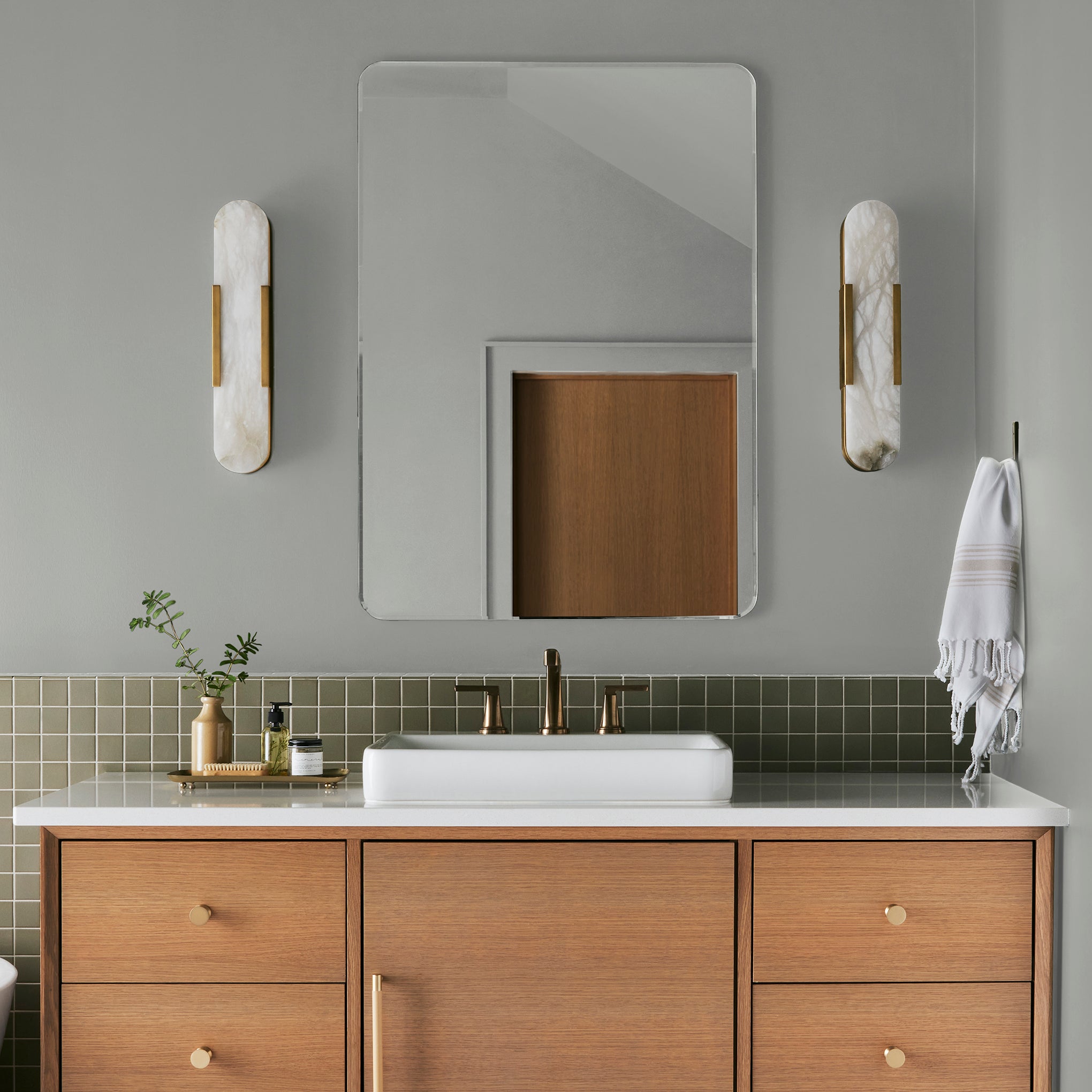 cool medium grey paint named day to day shown painted on bathroom wall