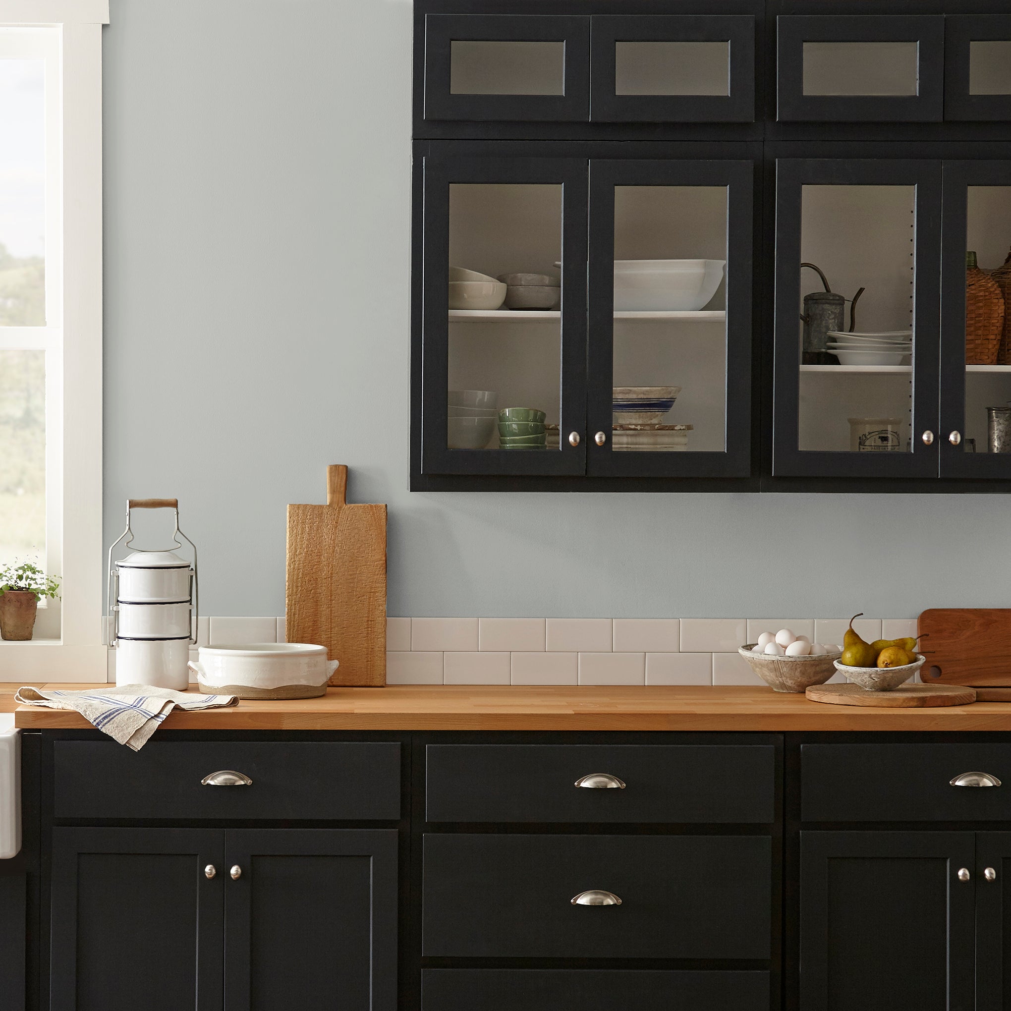 cool medium grey paint named day to day shown painted on kitchen wall