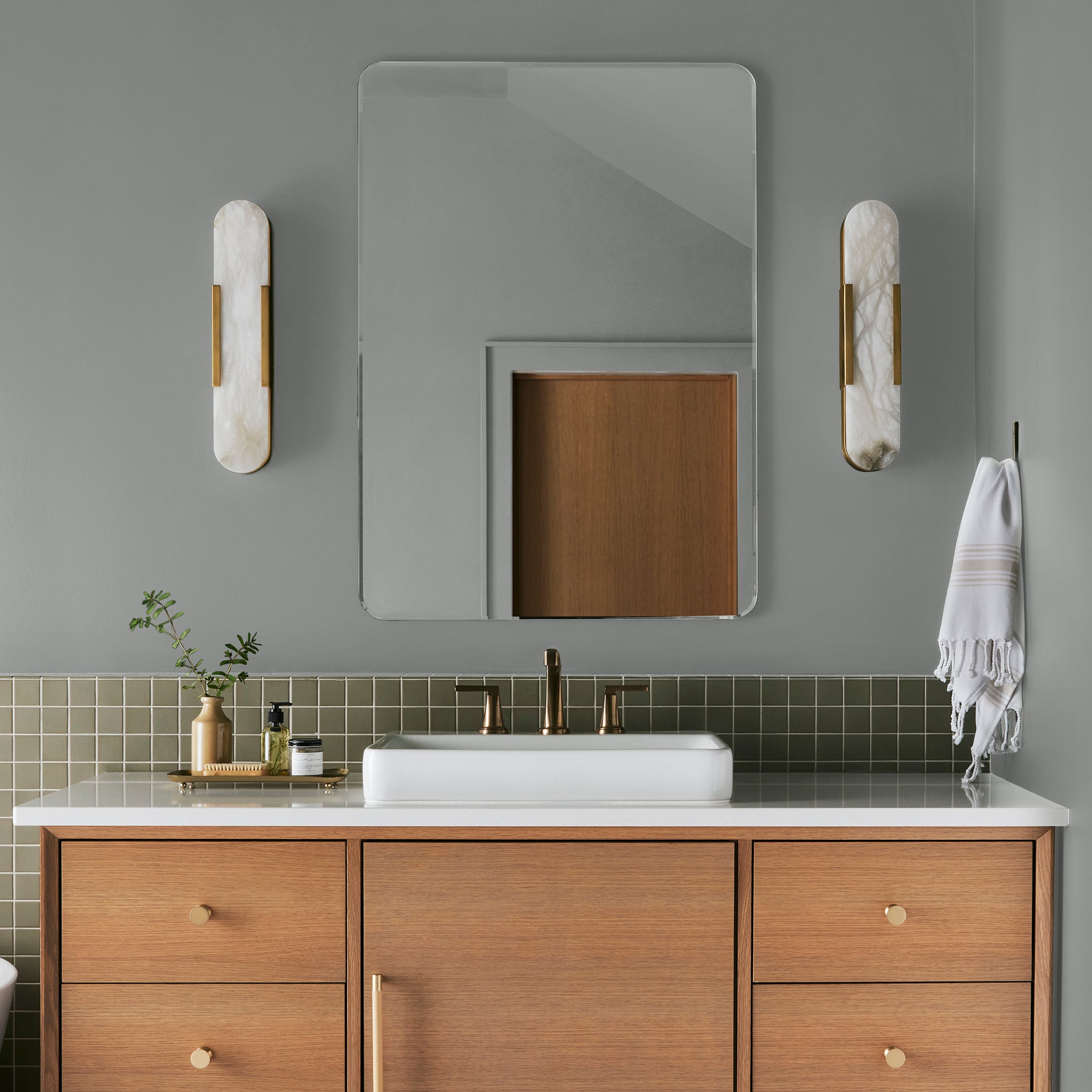 warm charcoal grey interior paint named vintage weathervane shown painted on bathroom wall