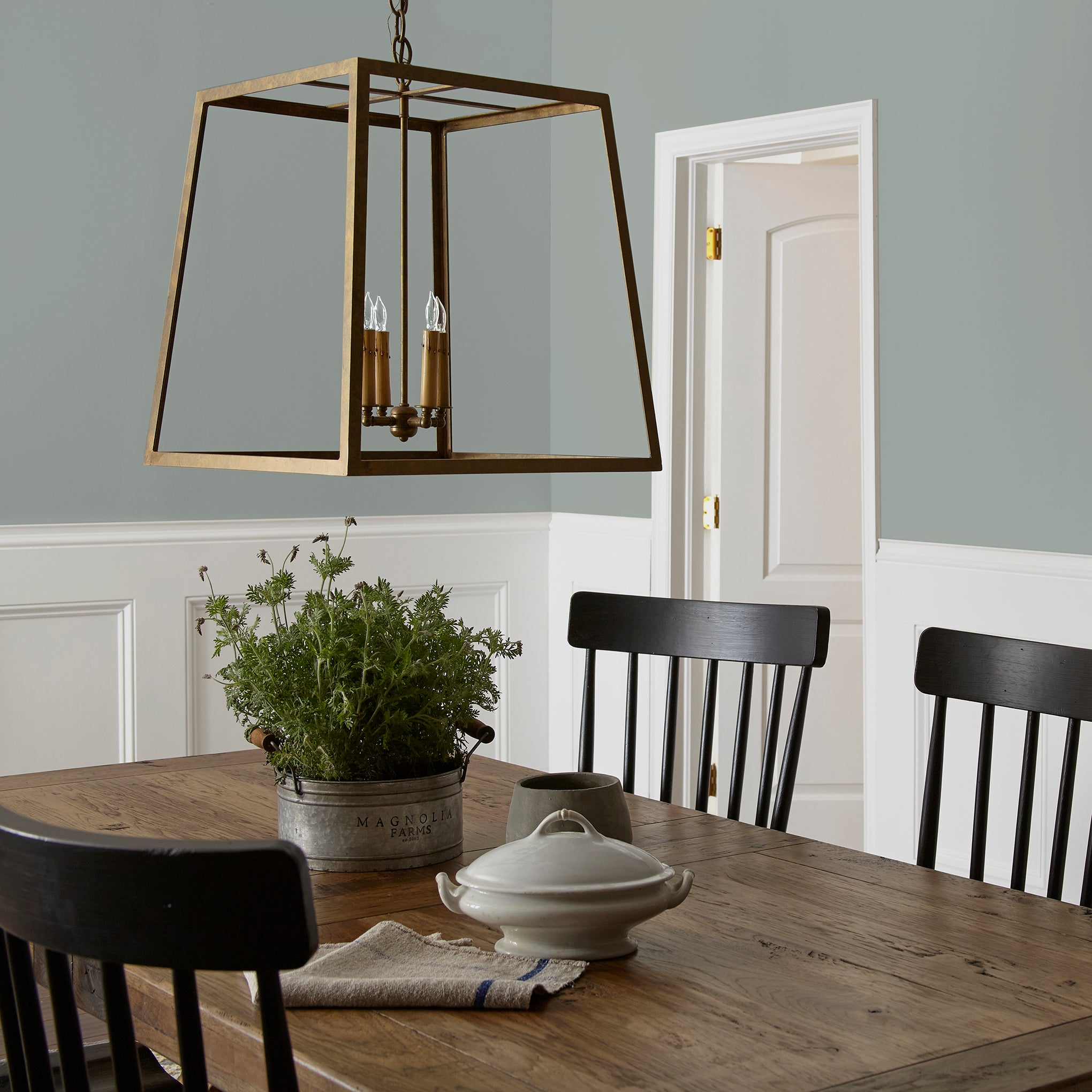 Cement gray with blue undertones interior paint named clean slate shown painted on dining room wall