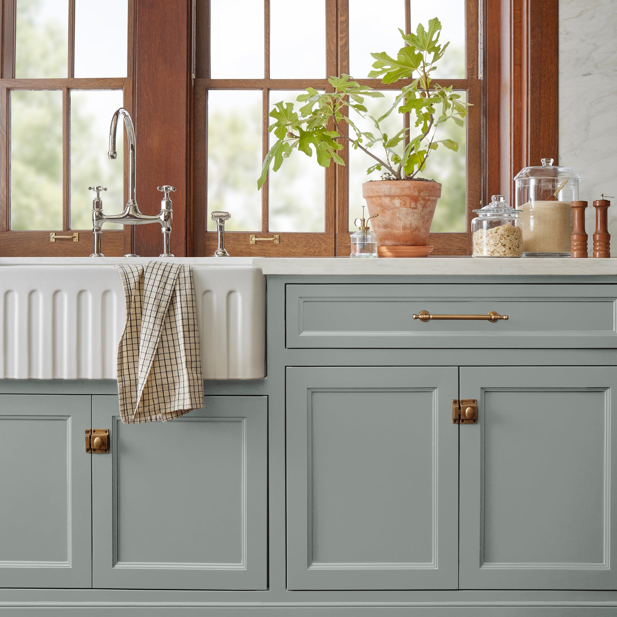 Cement gray with blue undertones door and cabinet paint named clean slate shown painted on kitchen cabinet  