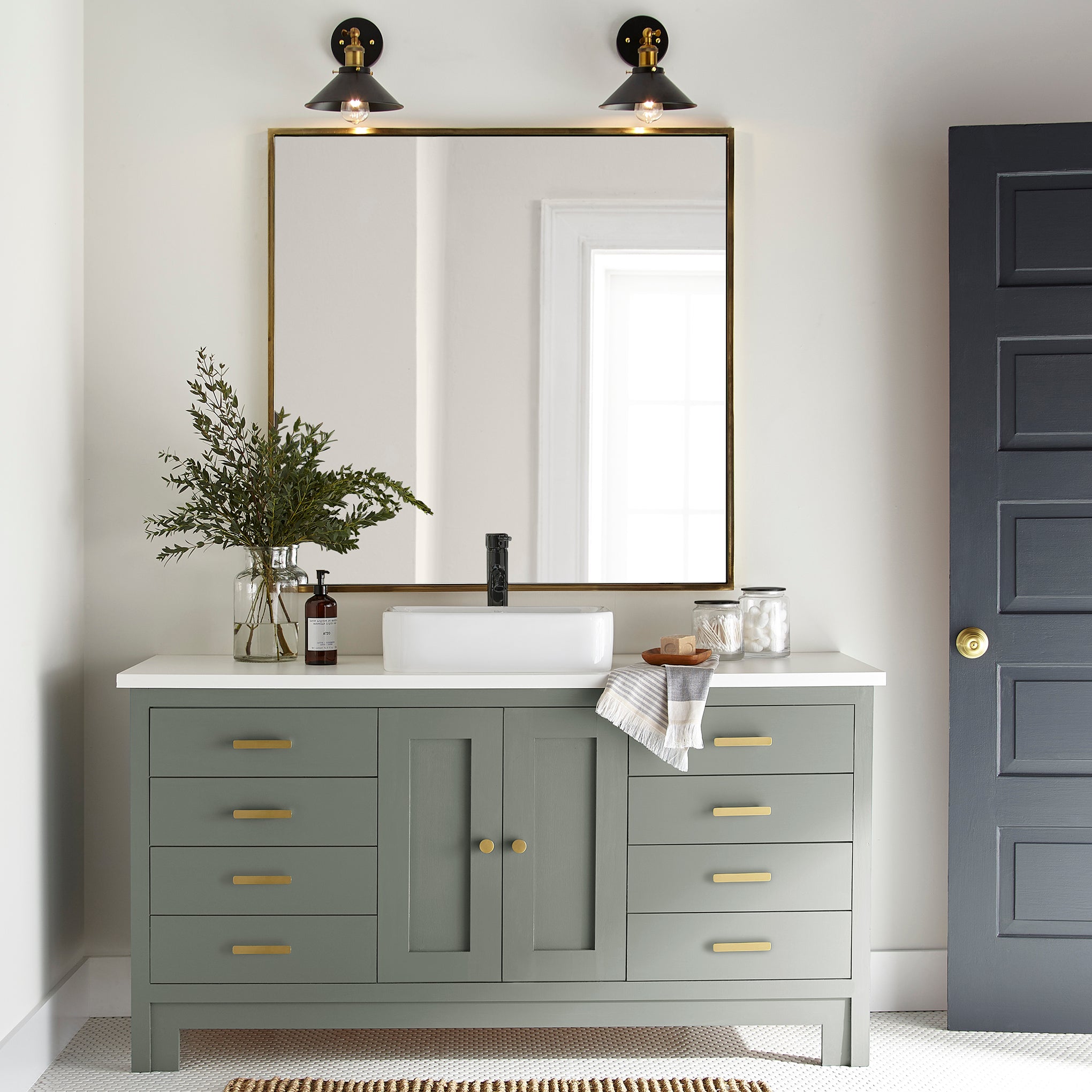 Pale ivy green door and cabinet paint named eden shown painted on bathroom cabinet