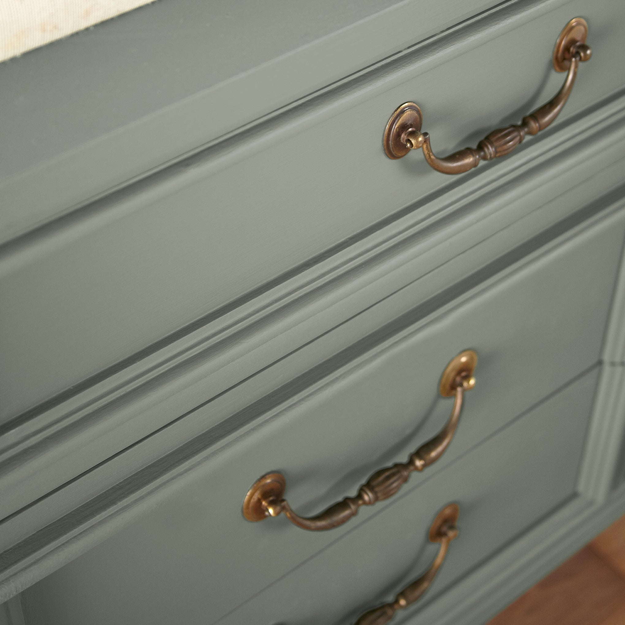 Pale ivy green door and cabinet paint named eden shown painted on cabinet