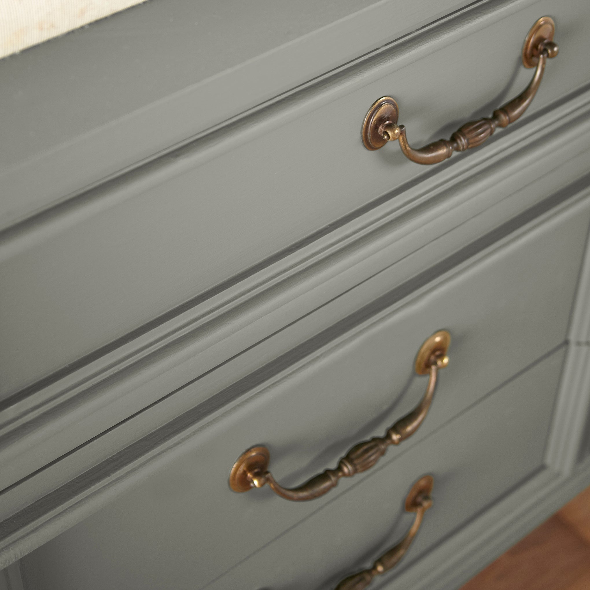 Gray with sage and olive green undertones door and cabinet paint named boutique gray shown painted on cabinet