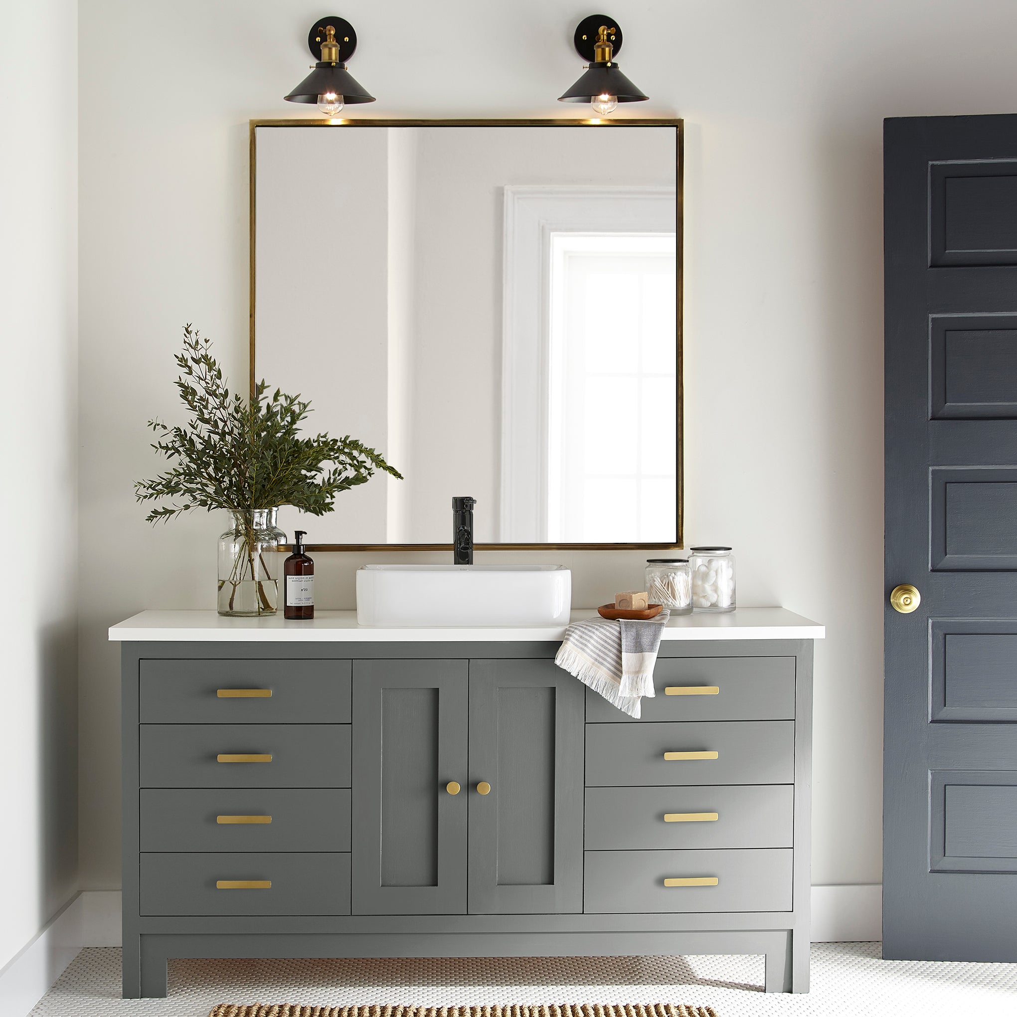 Deep haze gray with silver notes door and cabinet paint named pond stone shown painted on bathroom cabinet