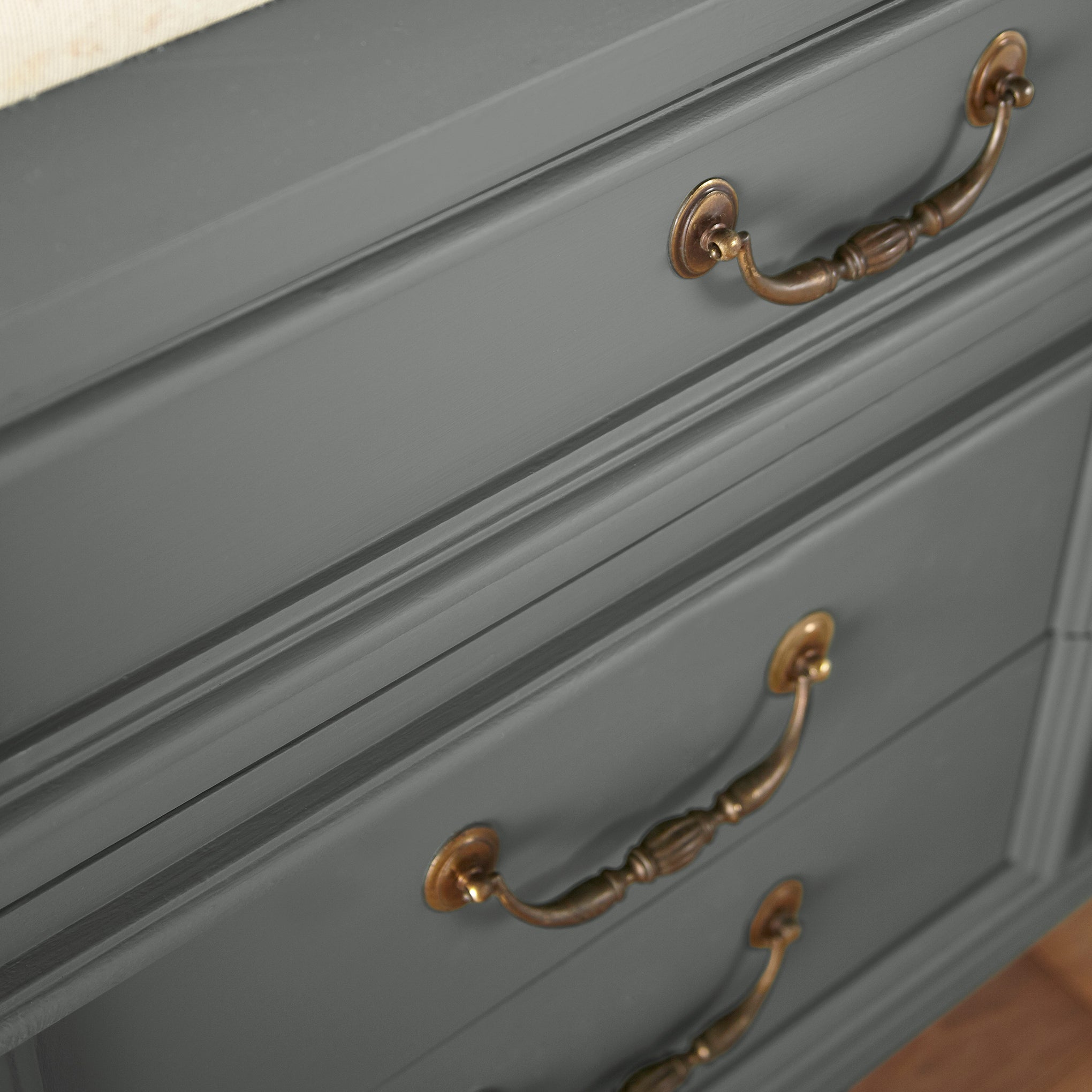 Deep haze gray with silver notes door and cabinet paint named pond stone shown painted on cabinet