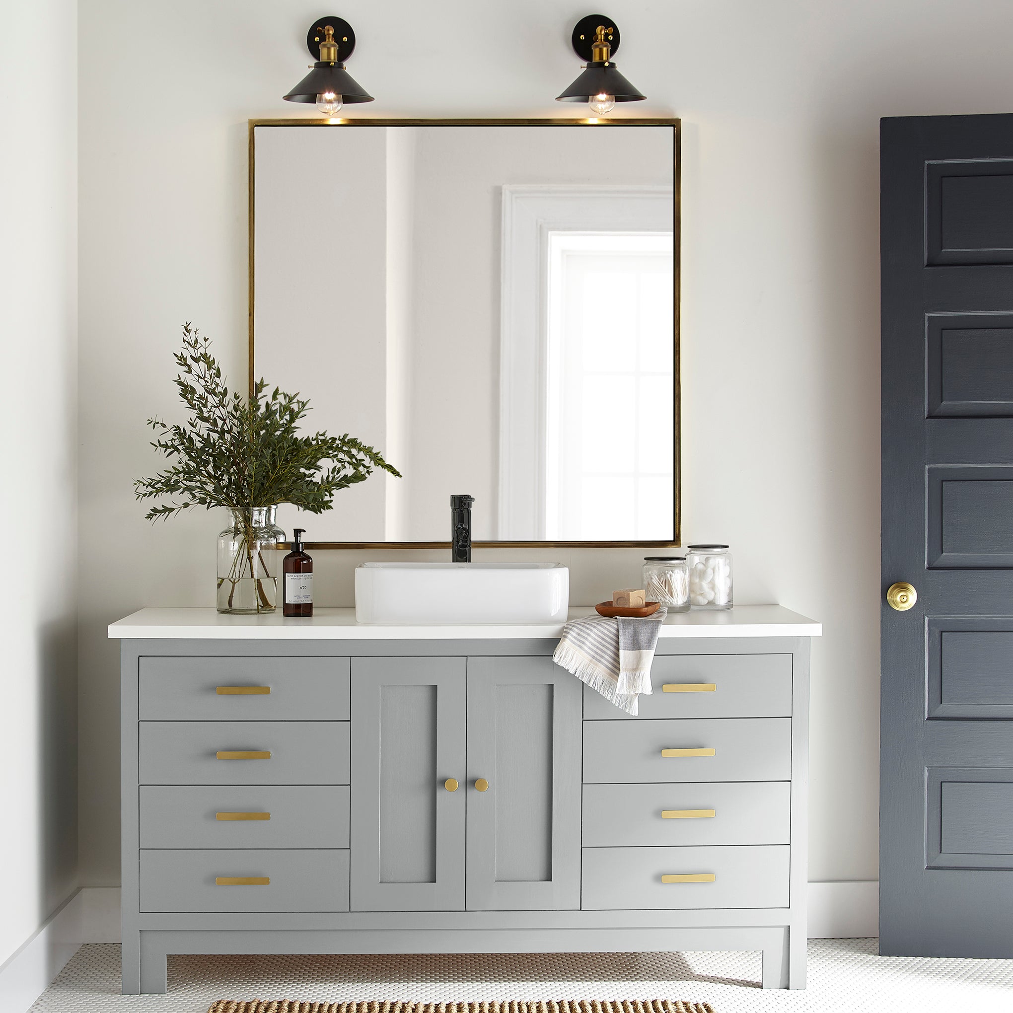 Light silver gray door and cabinet paint named loft shown painted on bathroom cabinet