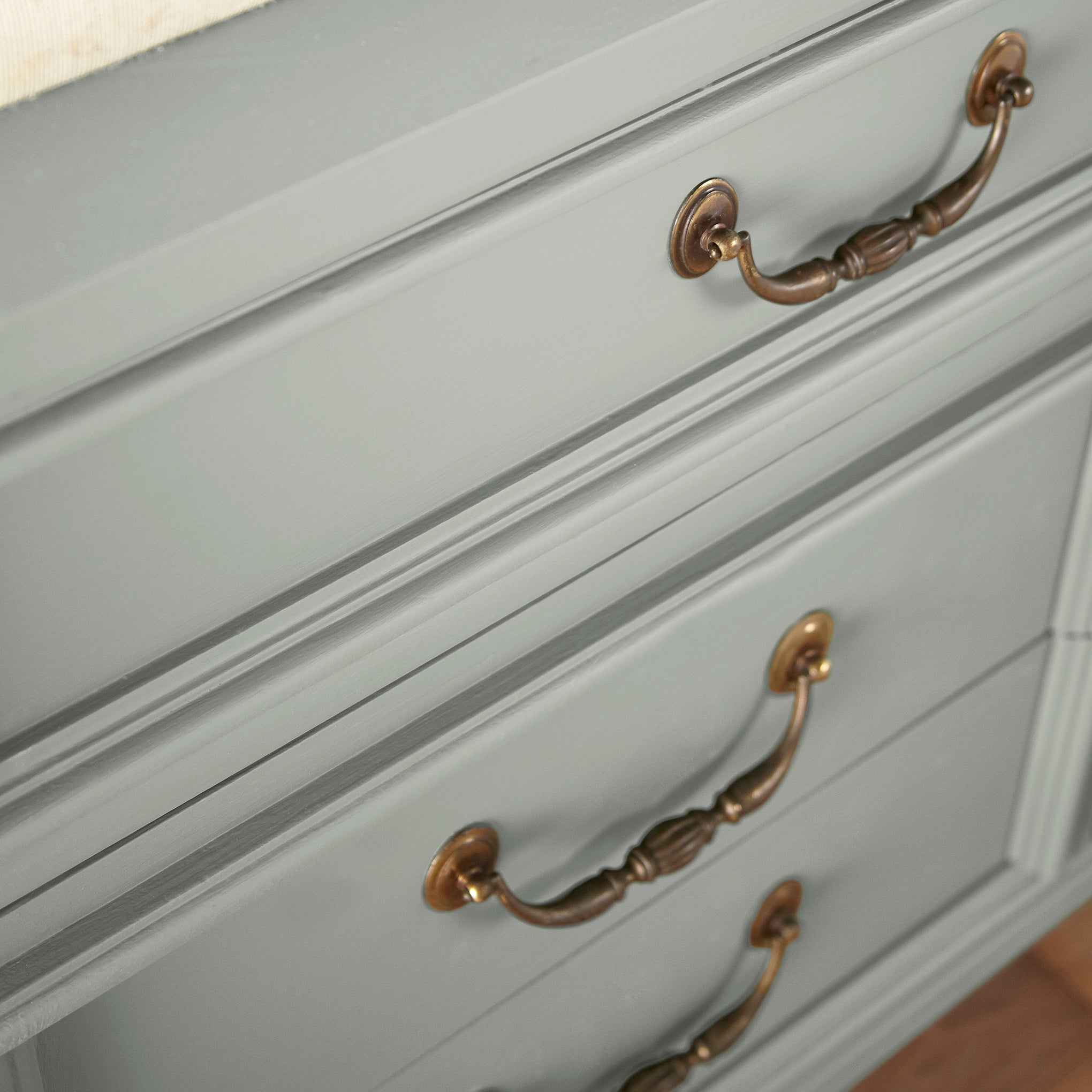 A light pale gray door and cabinet paint named early riser shown painted on cabinet