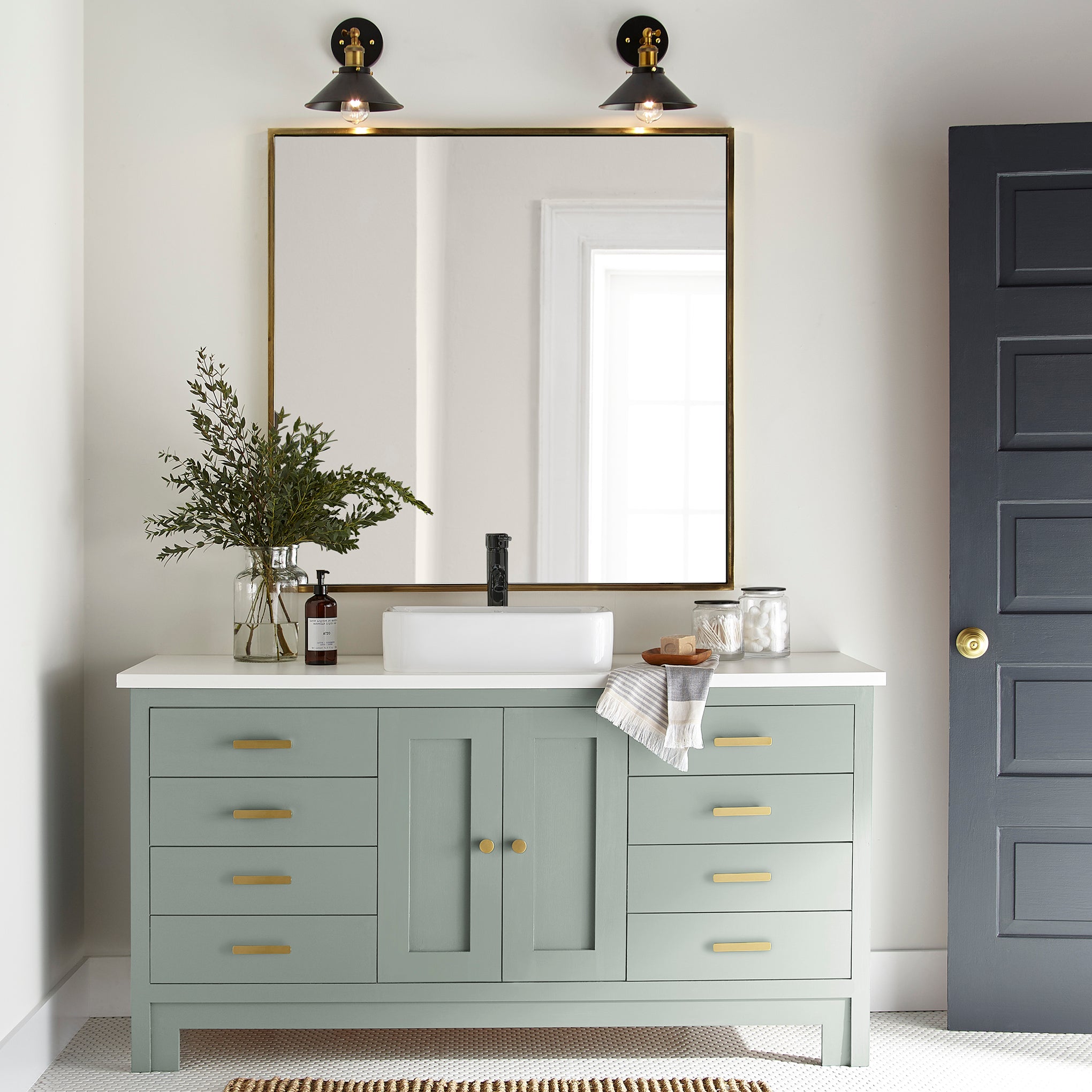 Creamy mint green door and cabinet paint named freshly cut stems shown painted on bathroom cabinet