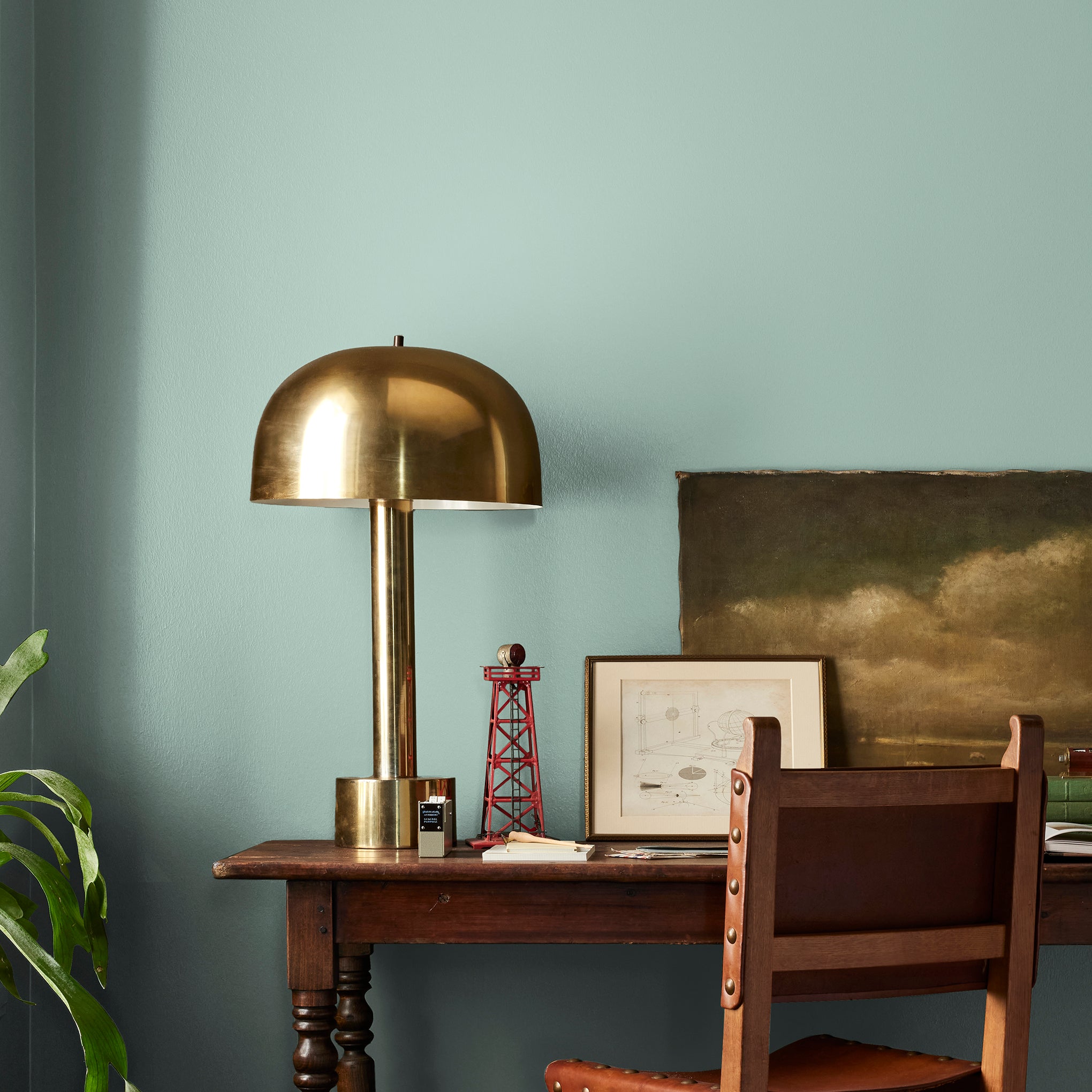 Aqua and minty blue slightly muted with gray interior paint named texas summer shown painted on bedroom wall