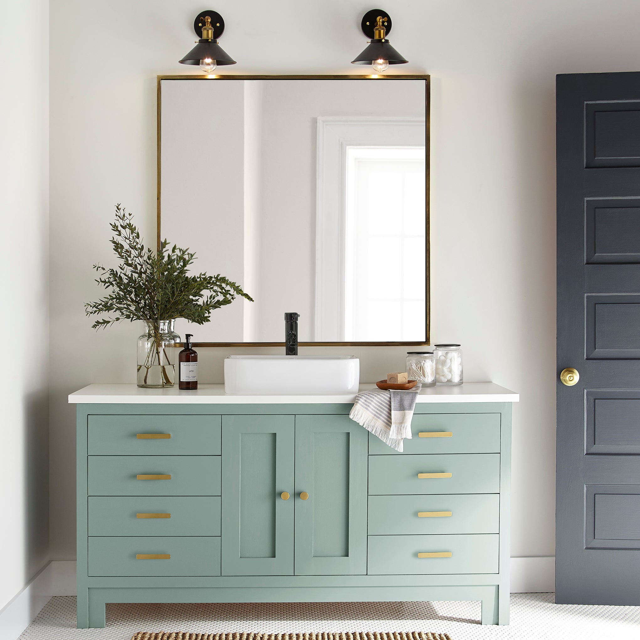 Aqua and minty blue slightly muted with gray door and cabinet paint named texas summer shown painted on bathroom cabinet