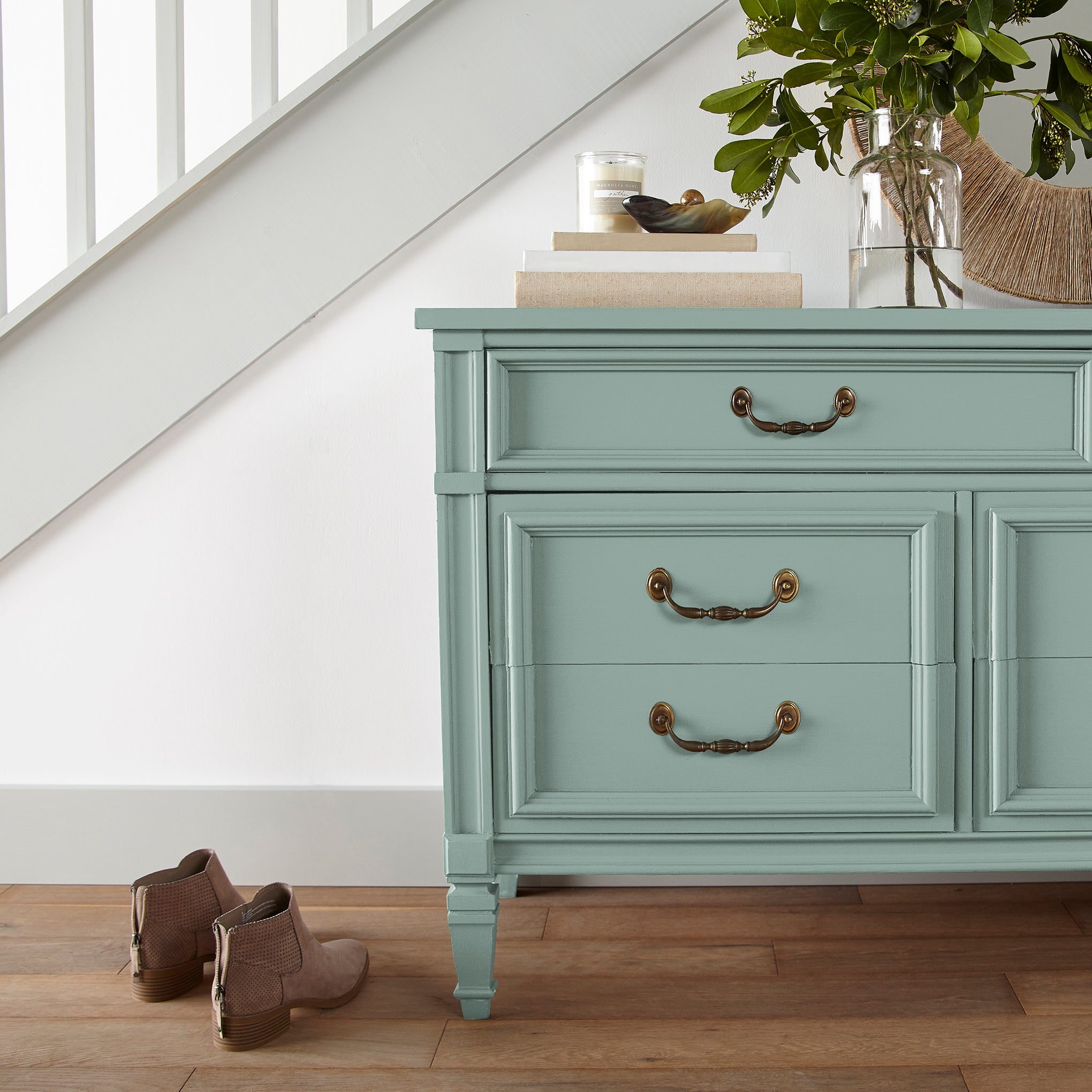 Aqua and minty blue slightly muted with gray door and cabinet paint named texas summer shown painted on entryway cabinet