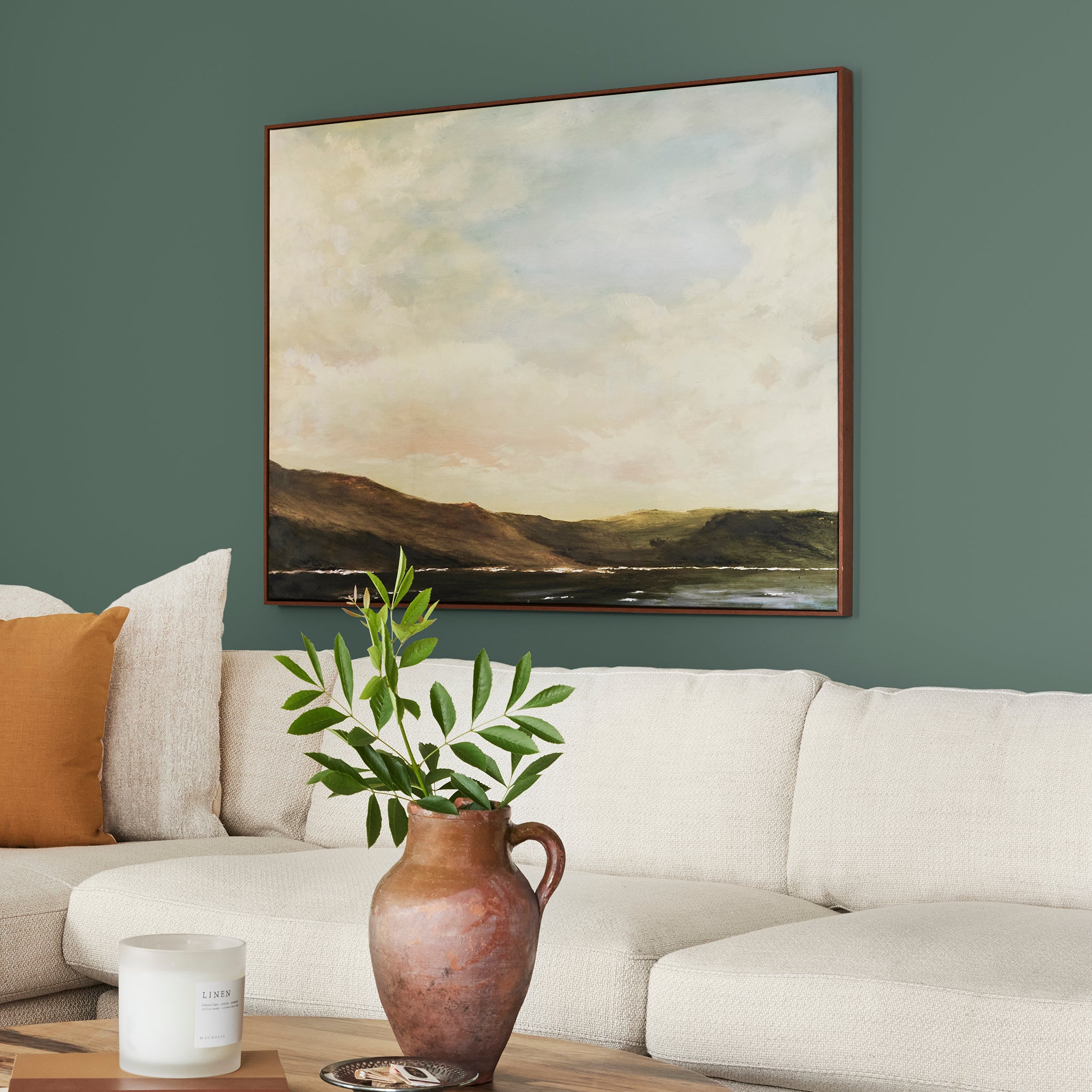 Deep hunter green interior paint named regal leaf shown painted on living room wall