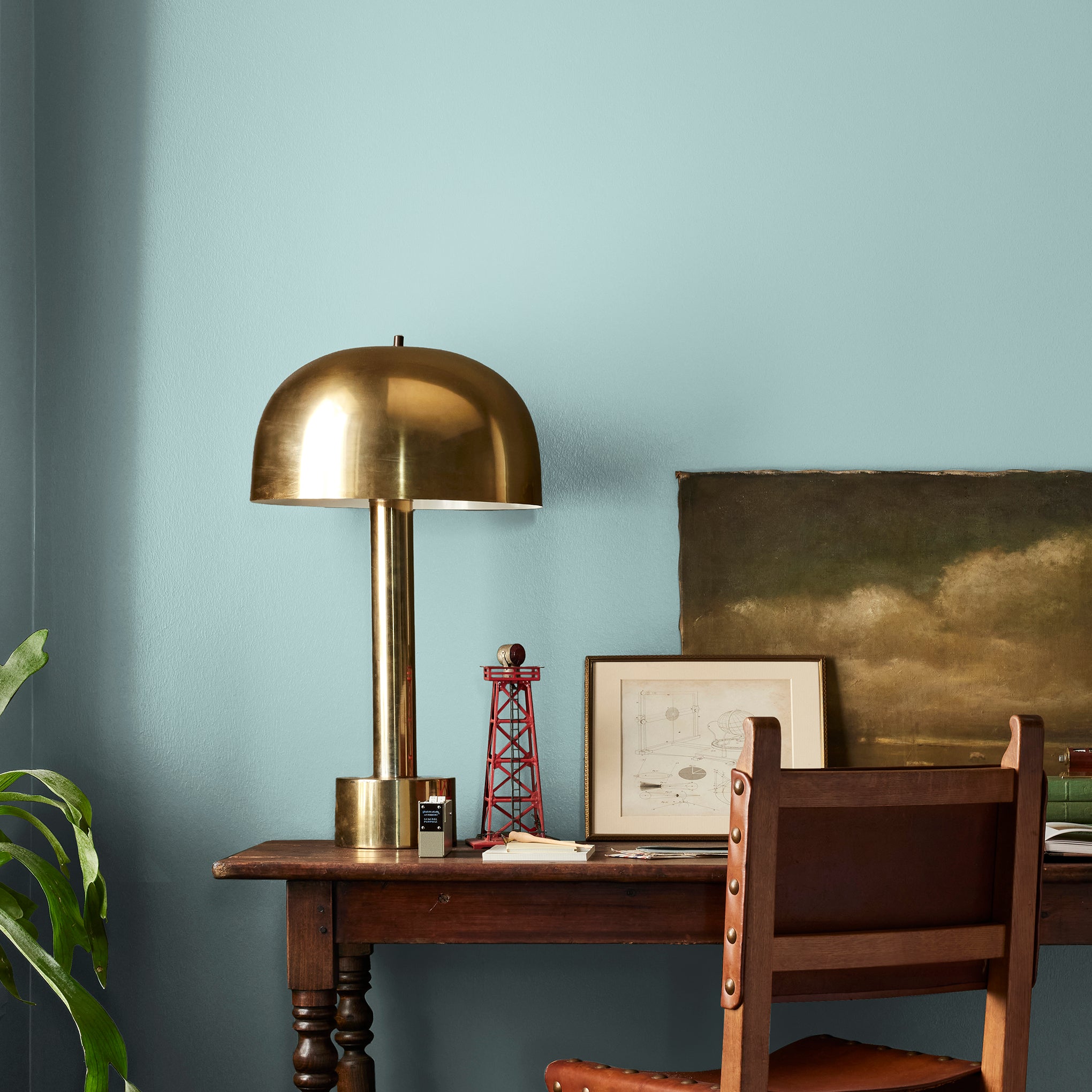 sky blue with grey undertone paint named it is well shown painted on bedroom wall