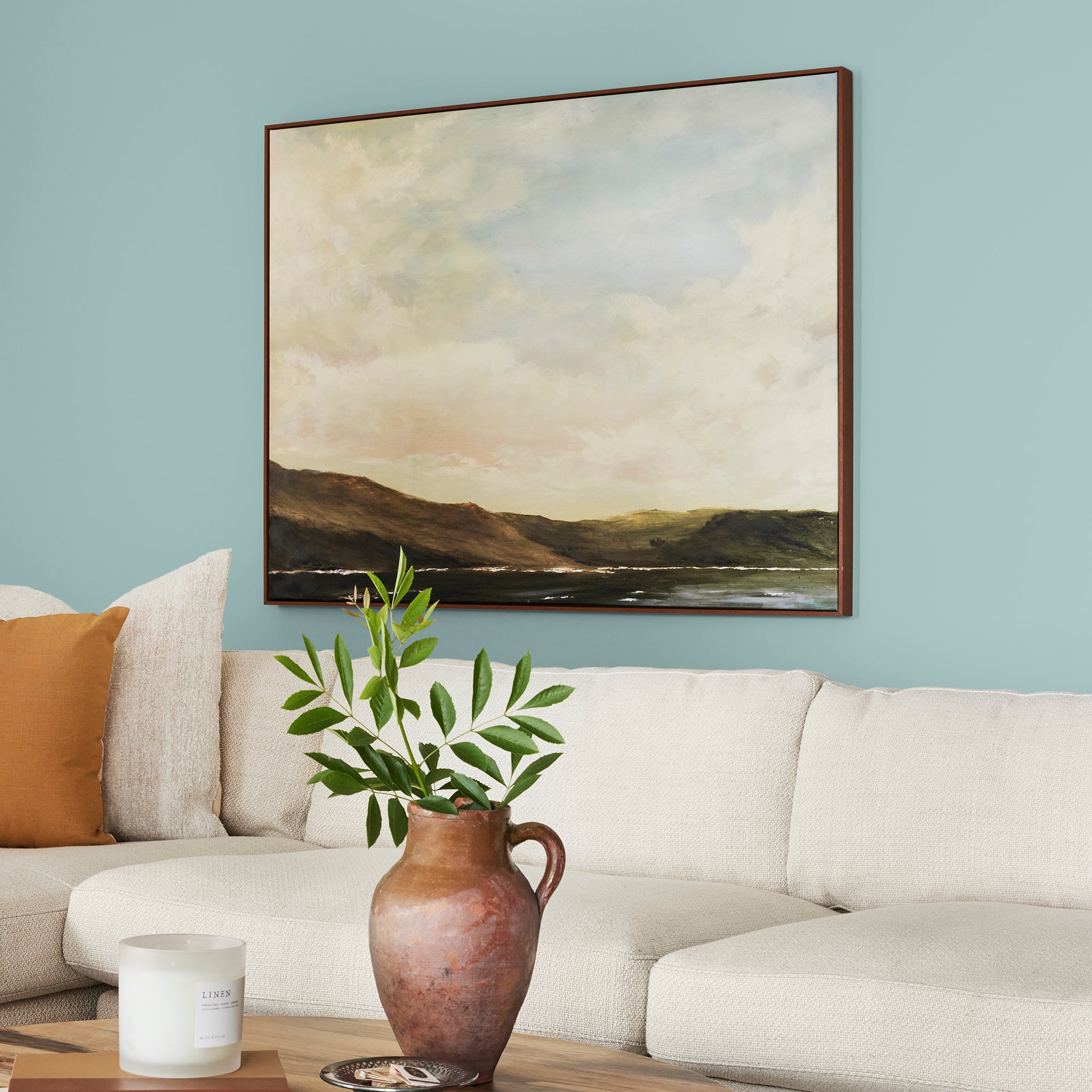 sky blue with grey undertone paint named it is well shown painted on living room wall