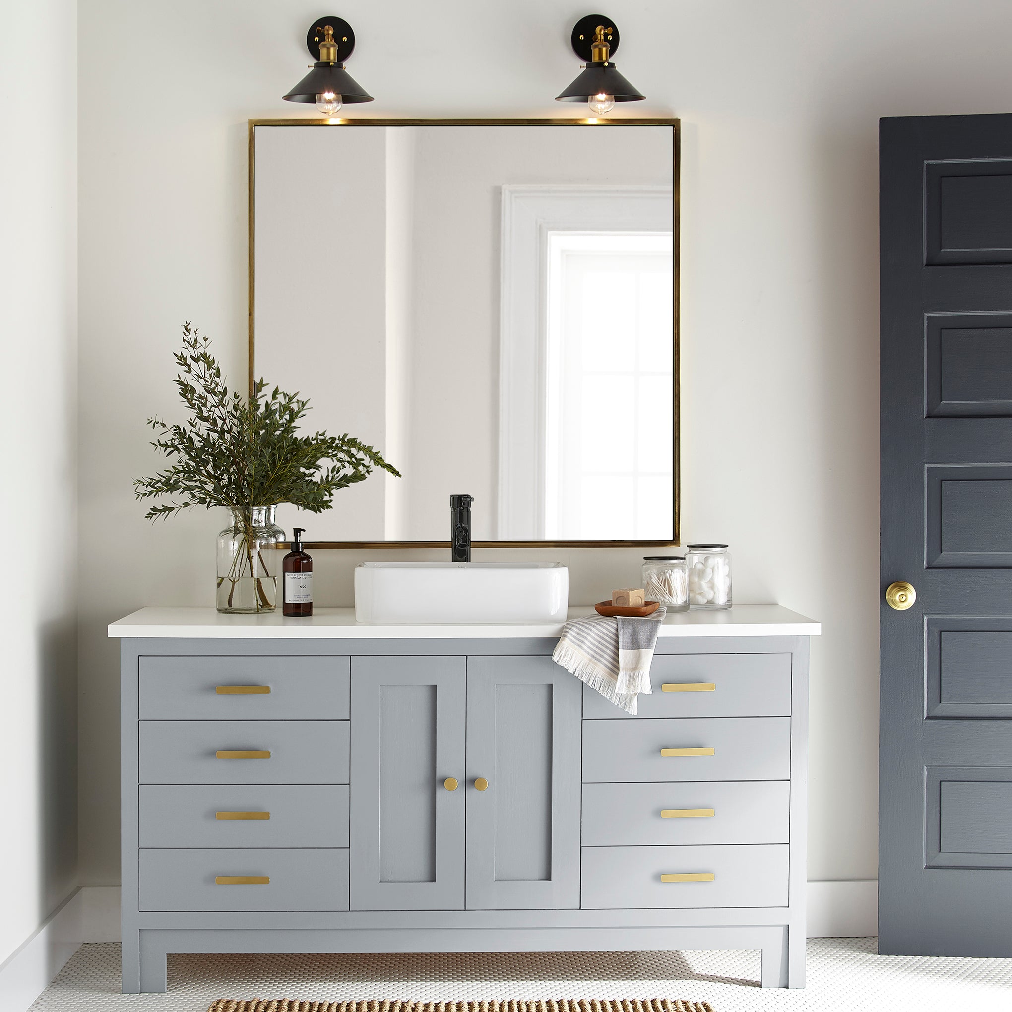 Soft cool gray door and cabinet paint named cement pots shown painted on bathroom cabinet