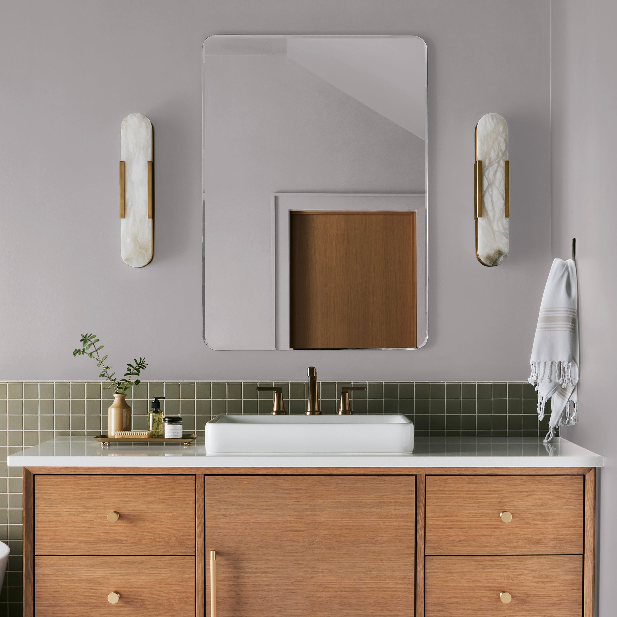 light muted lavender paint named in bloom shown painted on bathroom walls