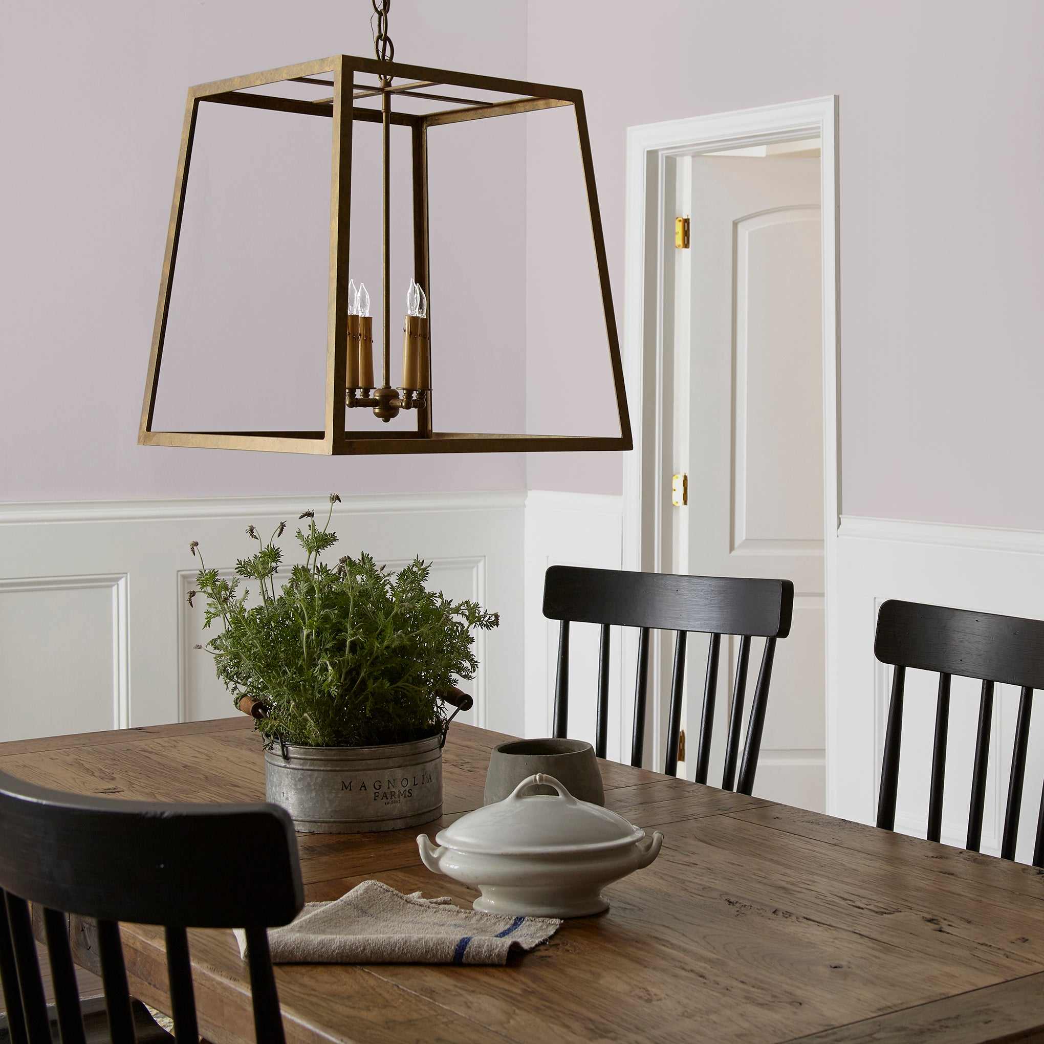 light muted lavender paint named in bloom shown painted on dining room walls