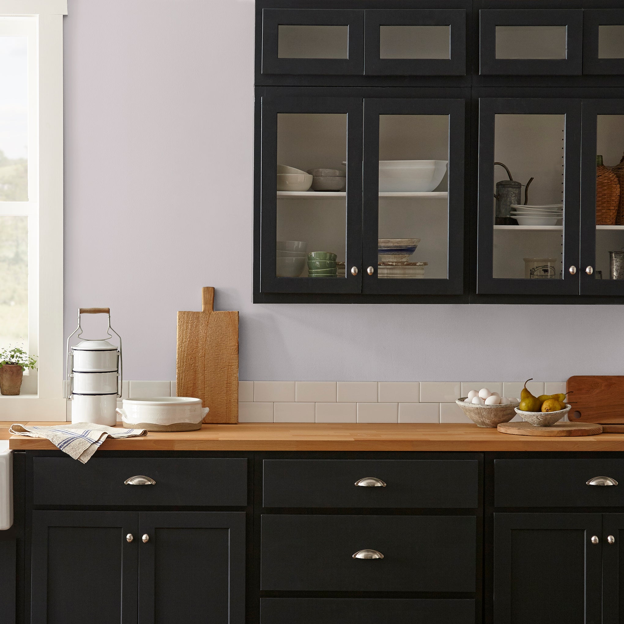 light muted lavender paint named in bloom shown painted on kitchen walls