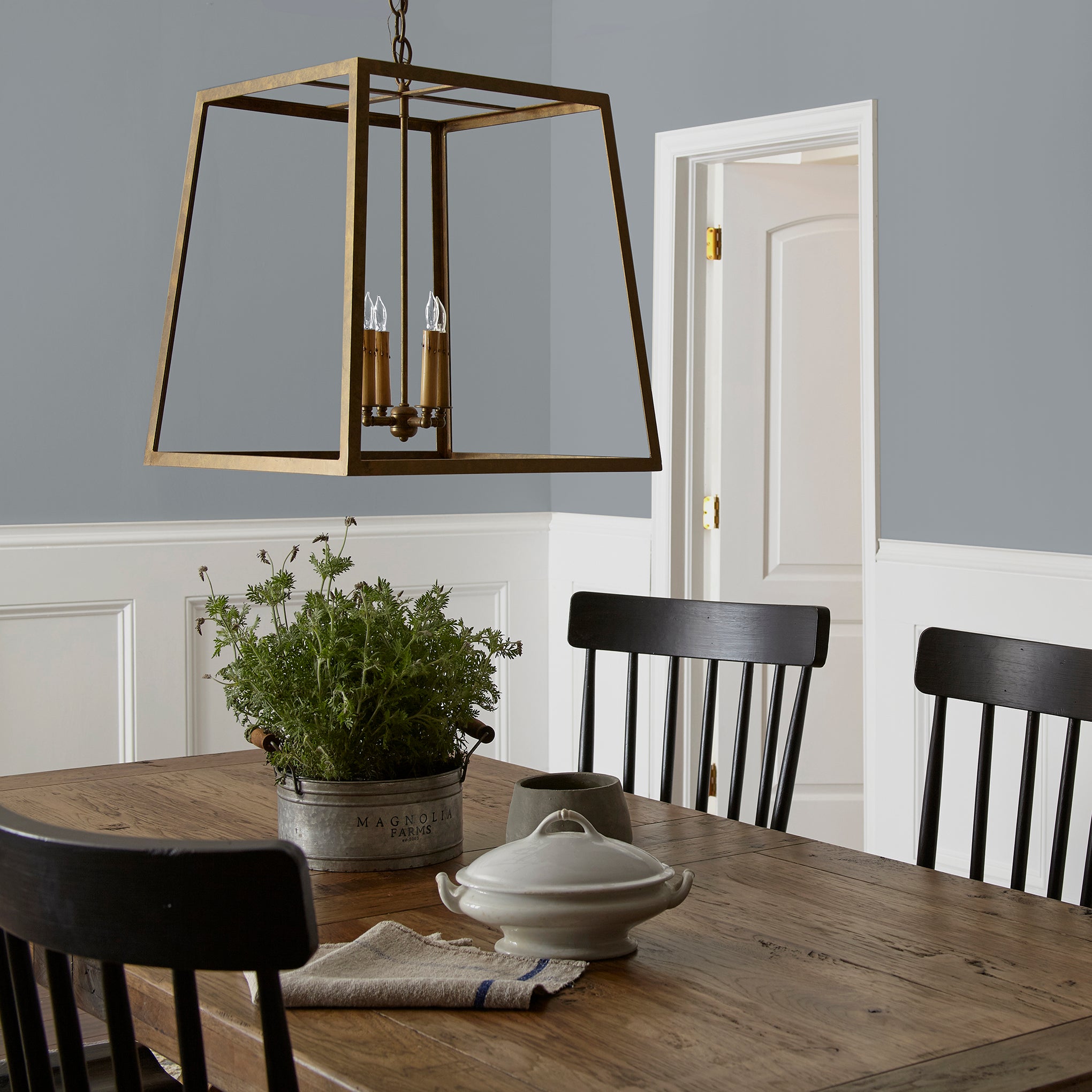dark cool grey paint named times past shown painted on dining room wall