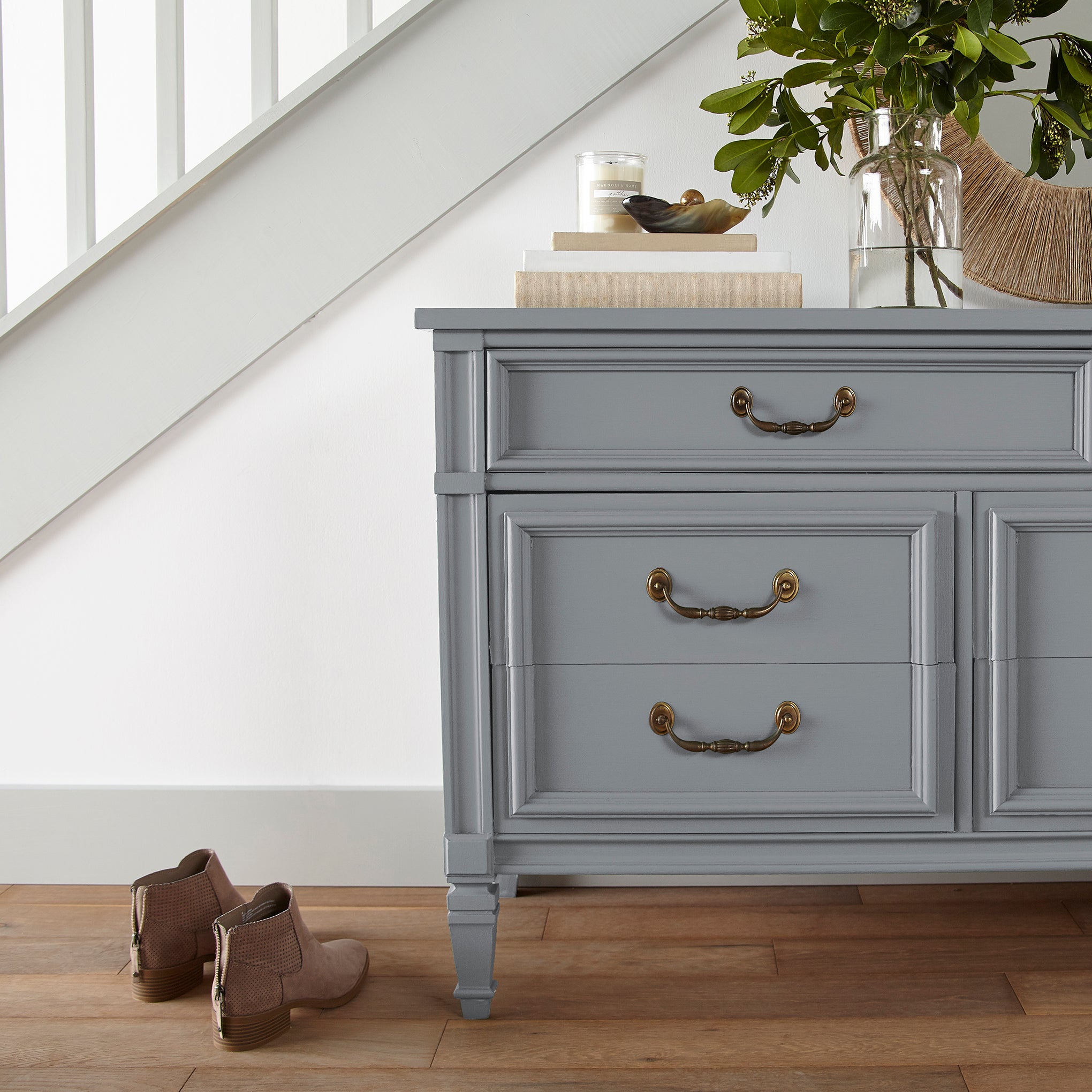 Deep cement gray door and cabinet paint named times past shown painted on entryway cabinet