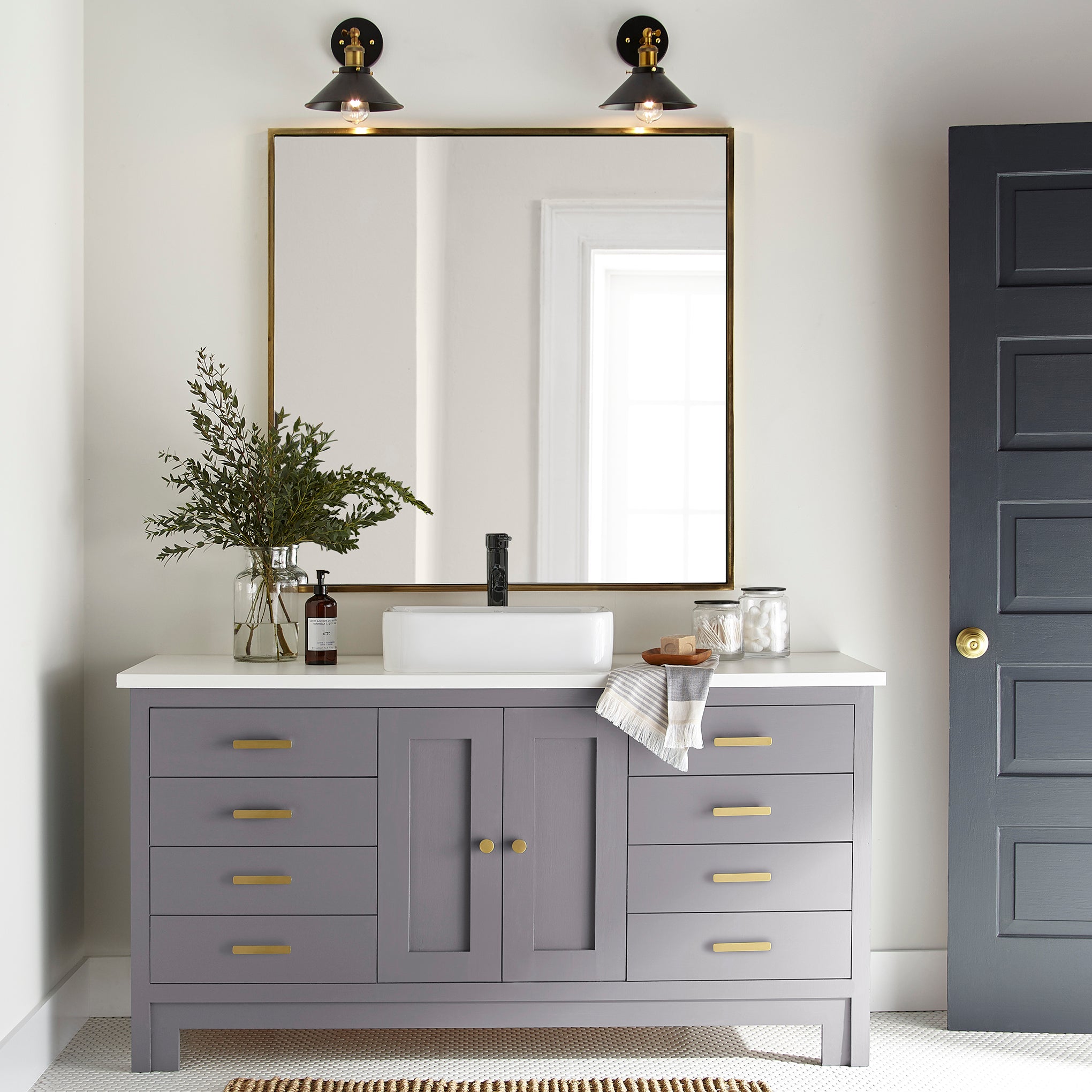 Deep pastel purple door and cabinet paint named pashmina plum shown painted on bathroom cabinet