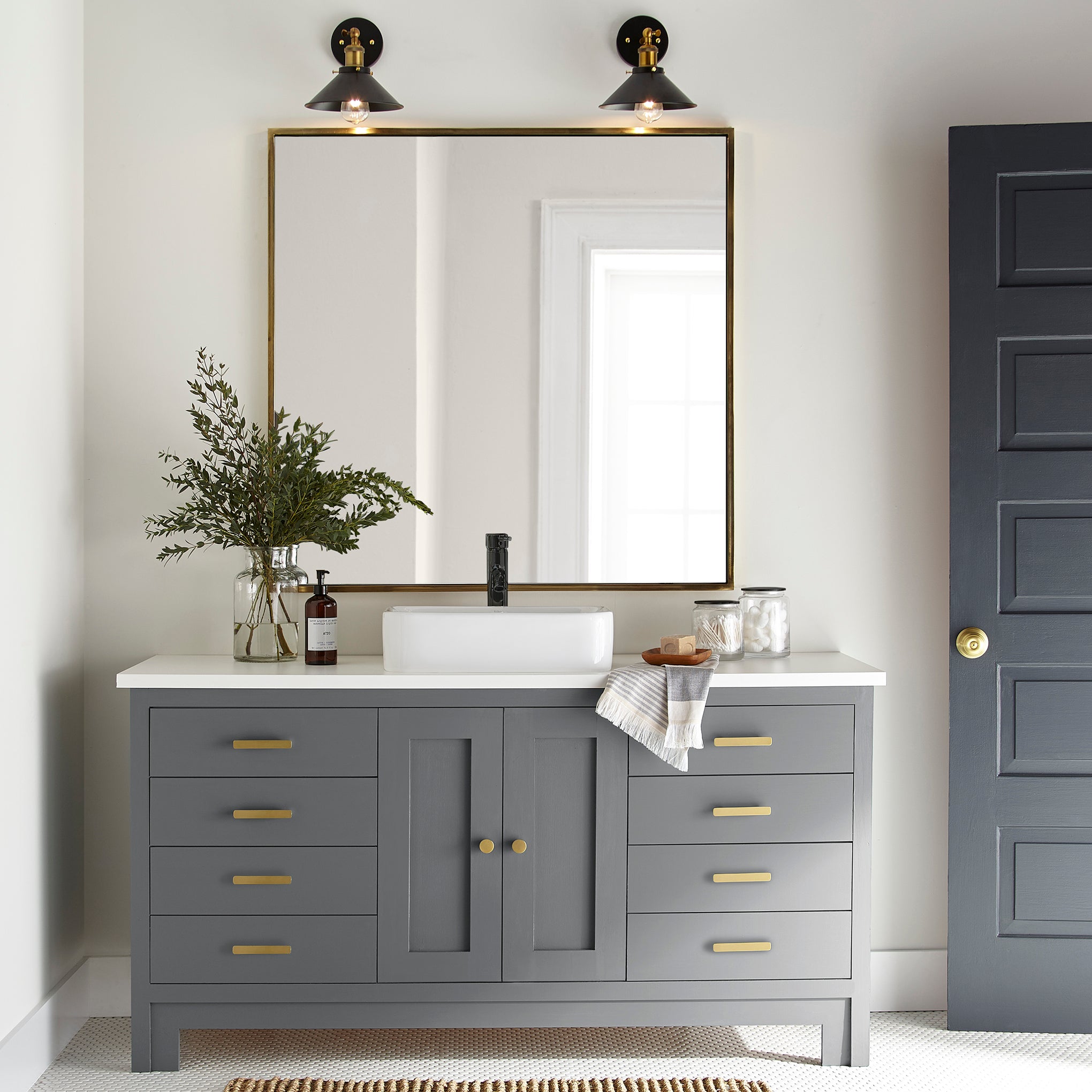 Deep slate gray with blue undertones door and cabinet paint named texas storm shown painted on bathroom cabinet