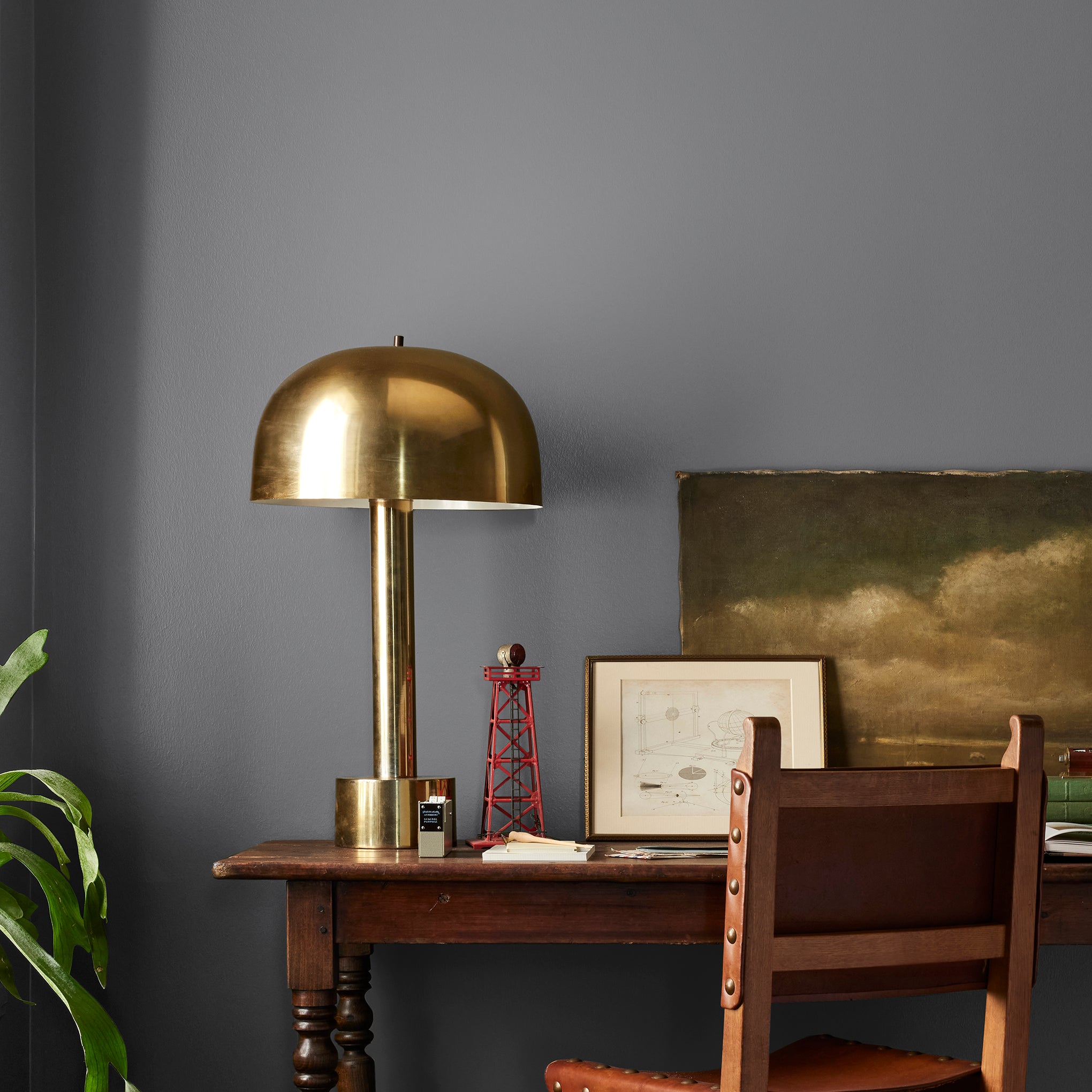 dark charcoal gray paint named autumn gray shown painted on bedroom wall