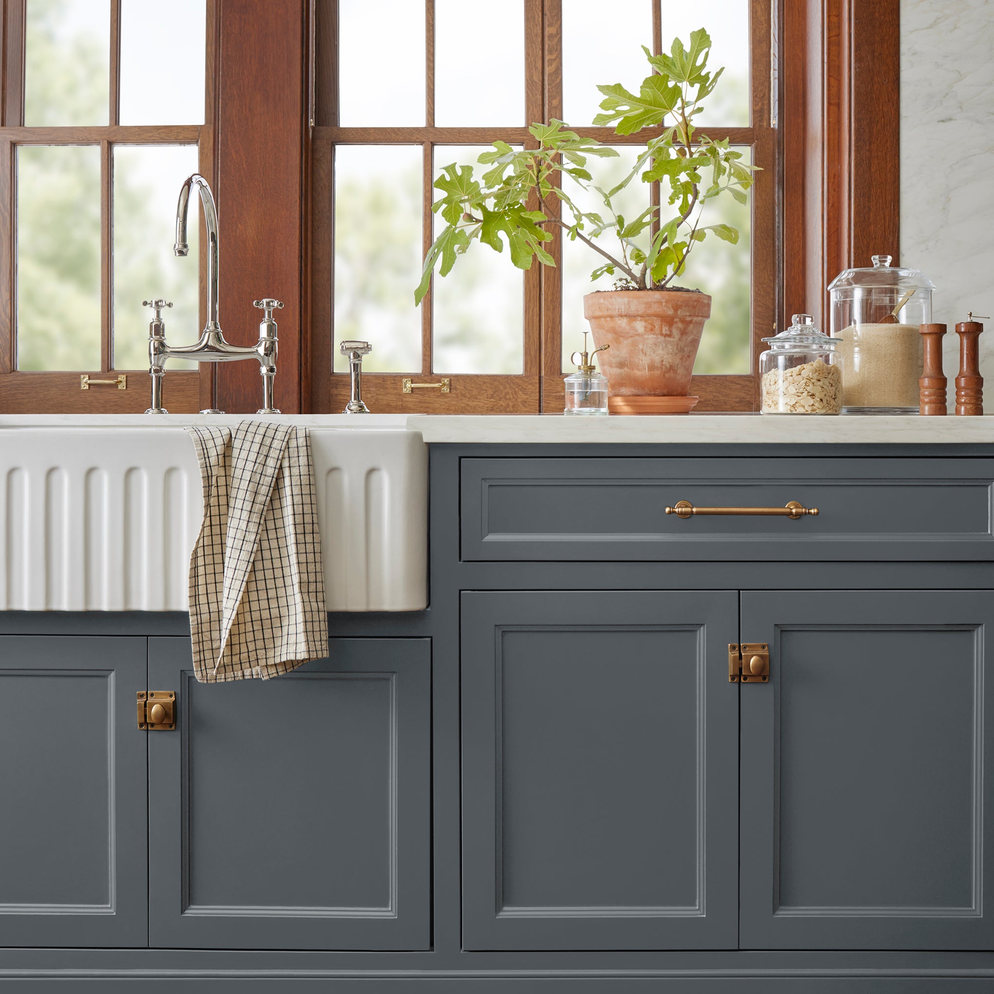 Almost black with blue undertones door and cabinet paint named fine black shown painted on kitchen cabinet