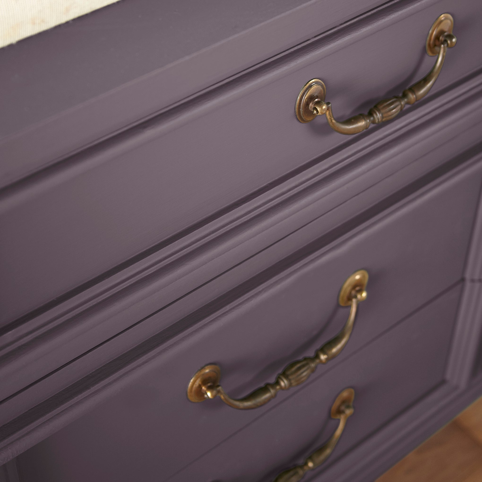 Deep eggplant purple door and cabinet paint named plum suede shown painted on cabinet