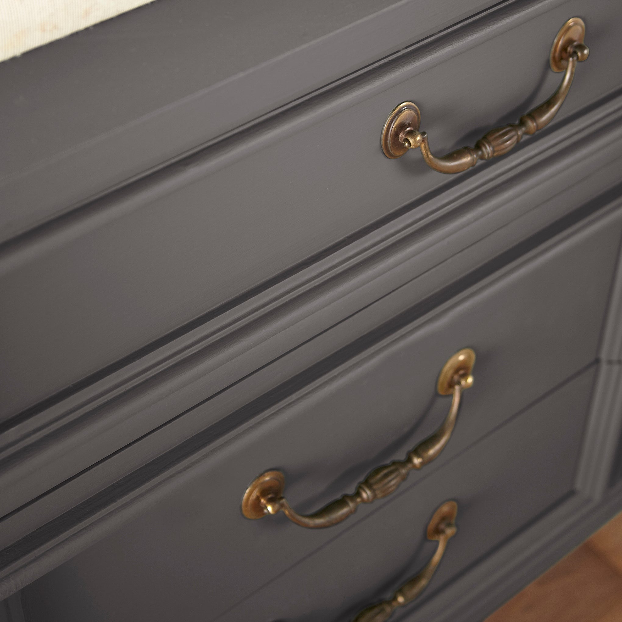 Deep brown with wine and beet red hues door and cabinet paint named pecan grove shown painted on cabinet