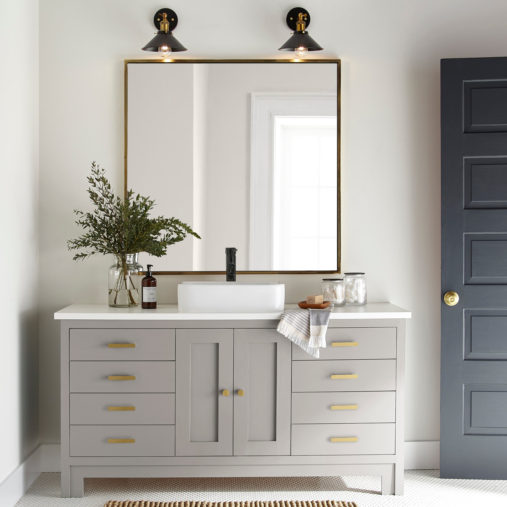 Soft tan with notes of gray door and cabinet paint named anatolian shown painted on bathroom cabinet