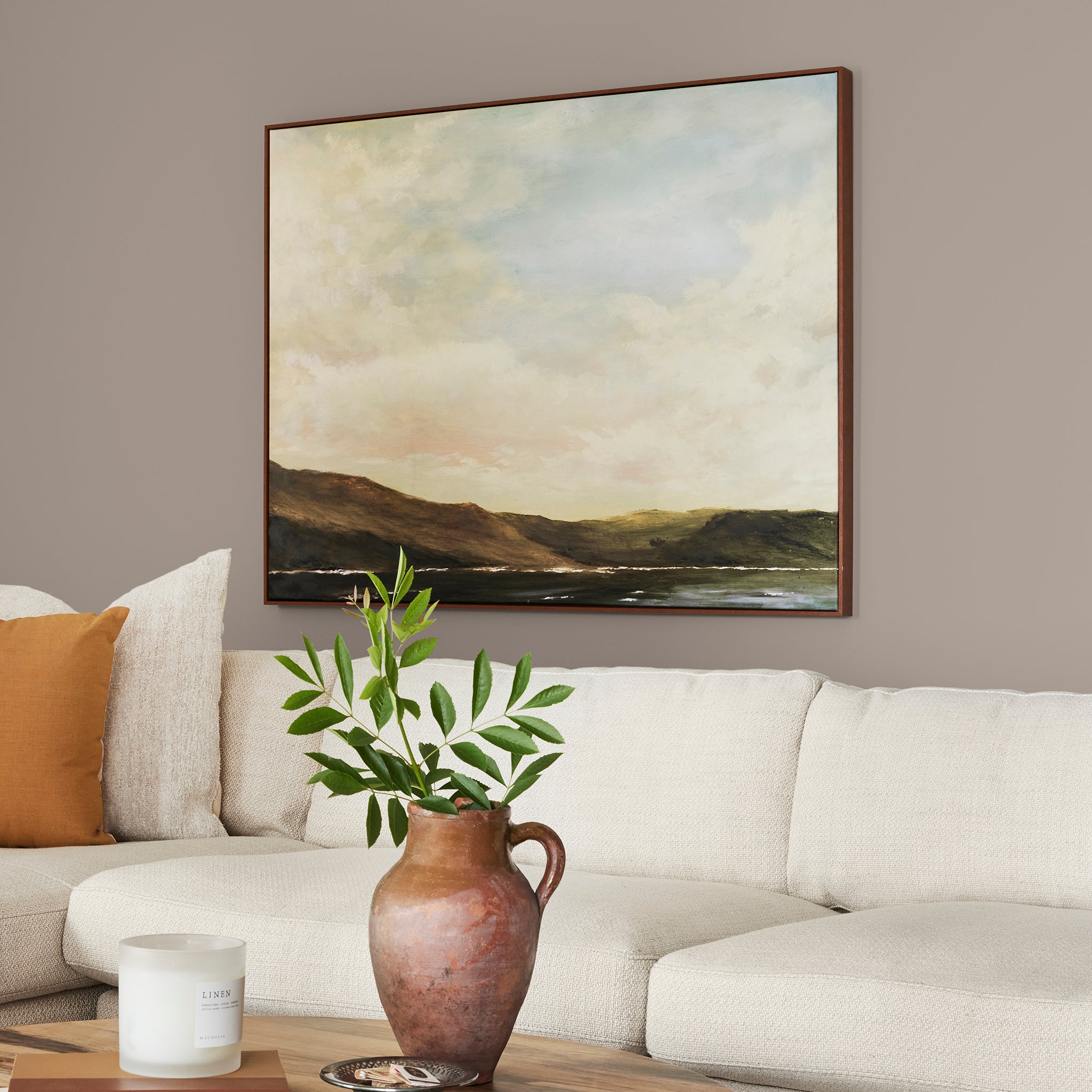 brownish taupe paint named antiquing shown painted on living room wall