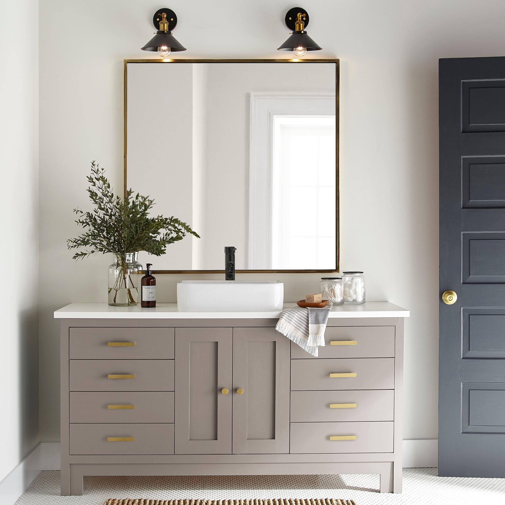 A taupe brown door and cabinet paint named antiquing shown painted on bathroom cabinet