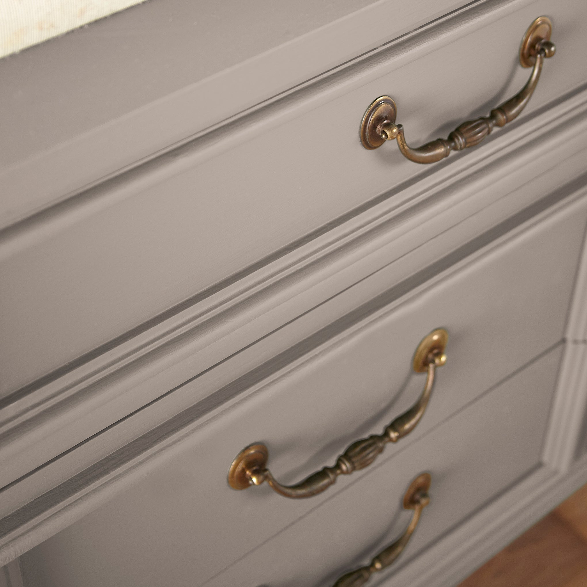 A taupe brown door and cabinet paint named antiquing shown painted on cabinet