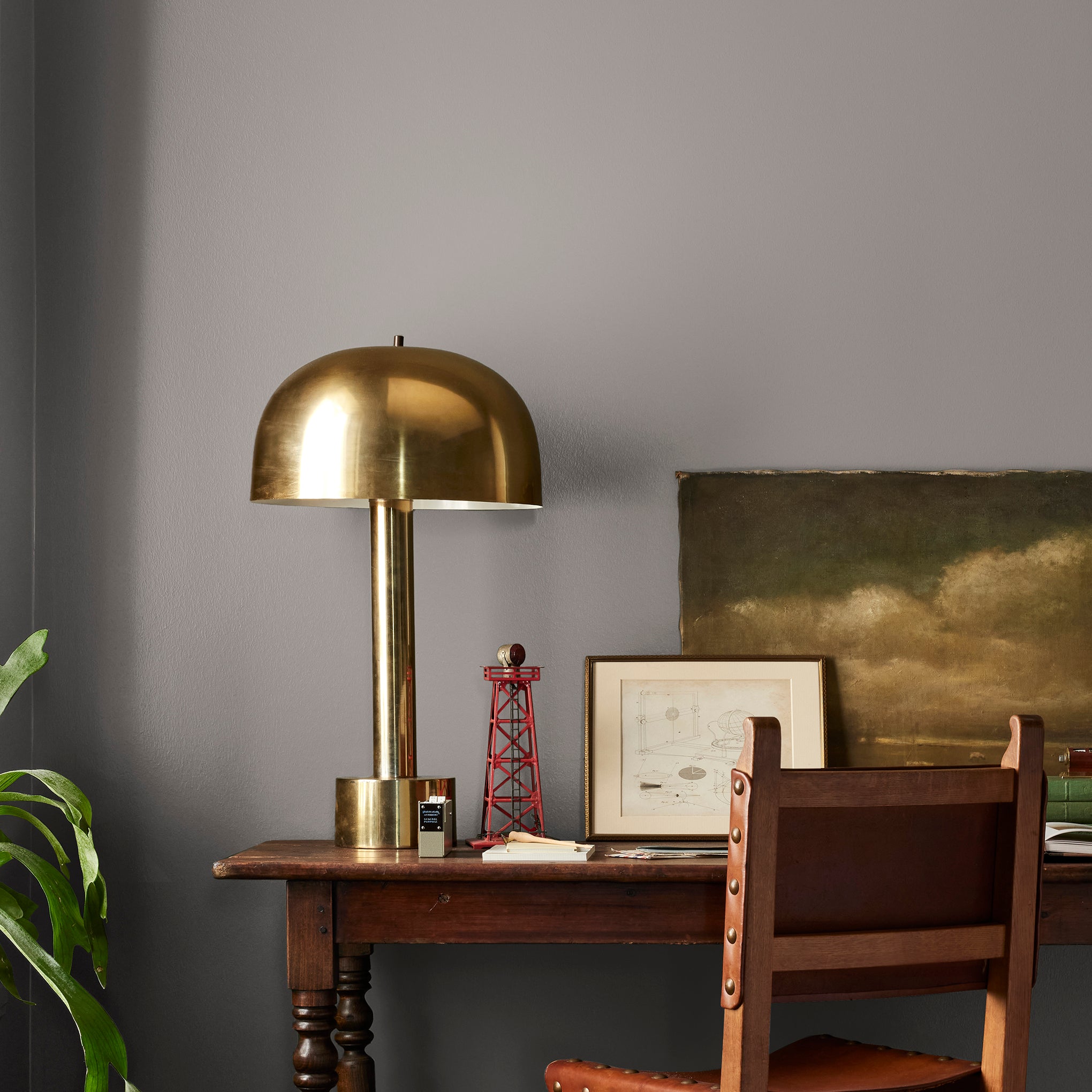 mousy brown interior paint named wooden palette shown painted on bedroom wall