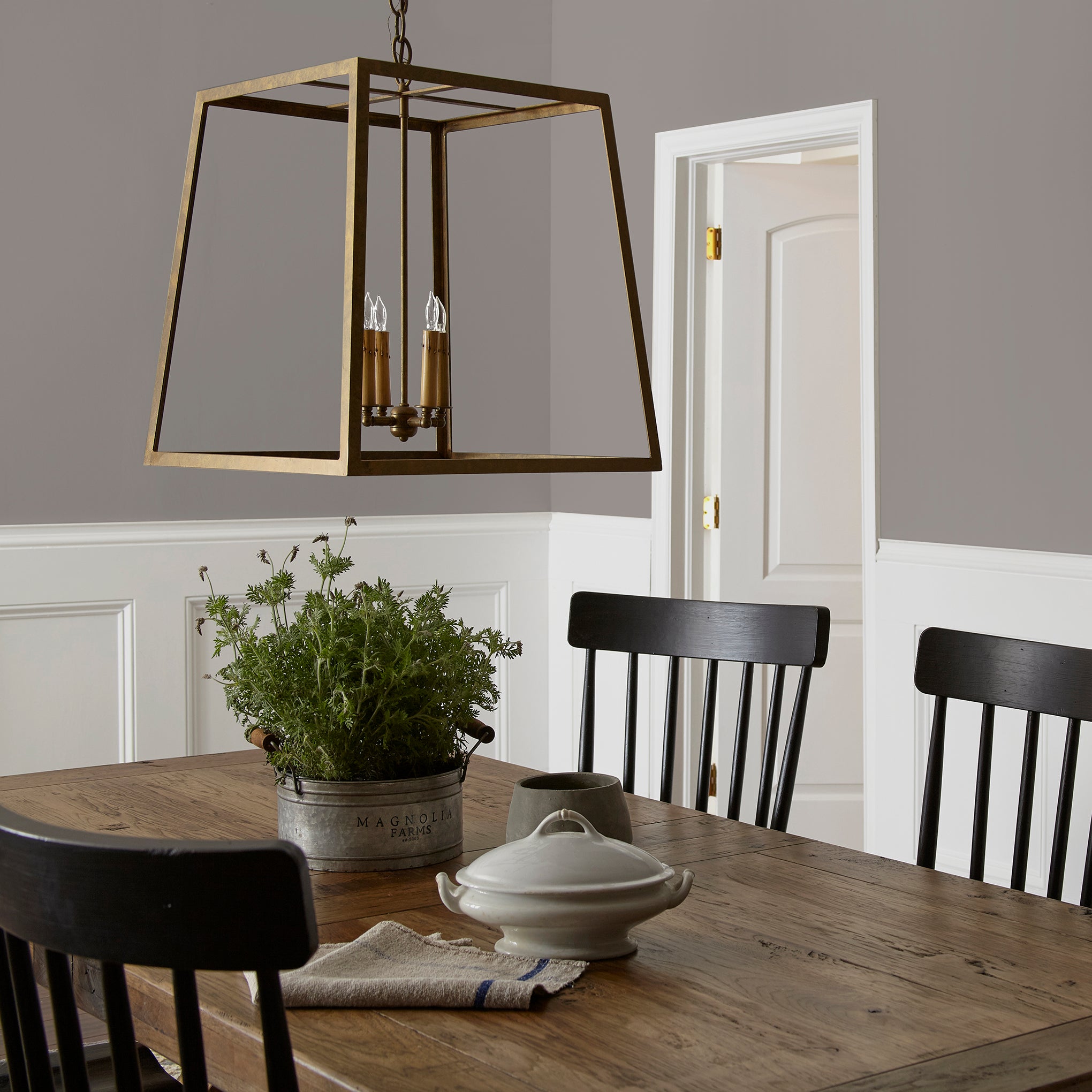 mousy brown interior paint named wooden palette shown painted on dining room wall