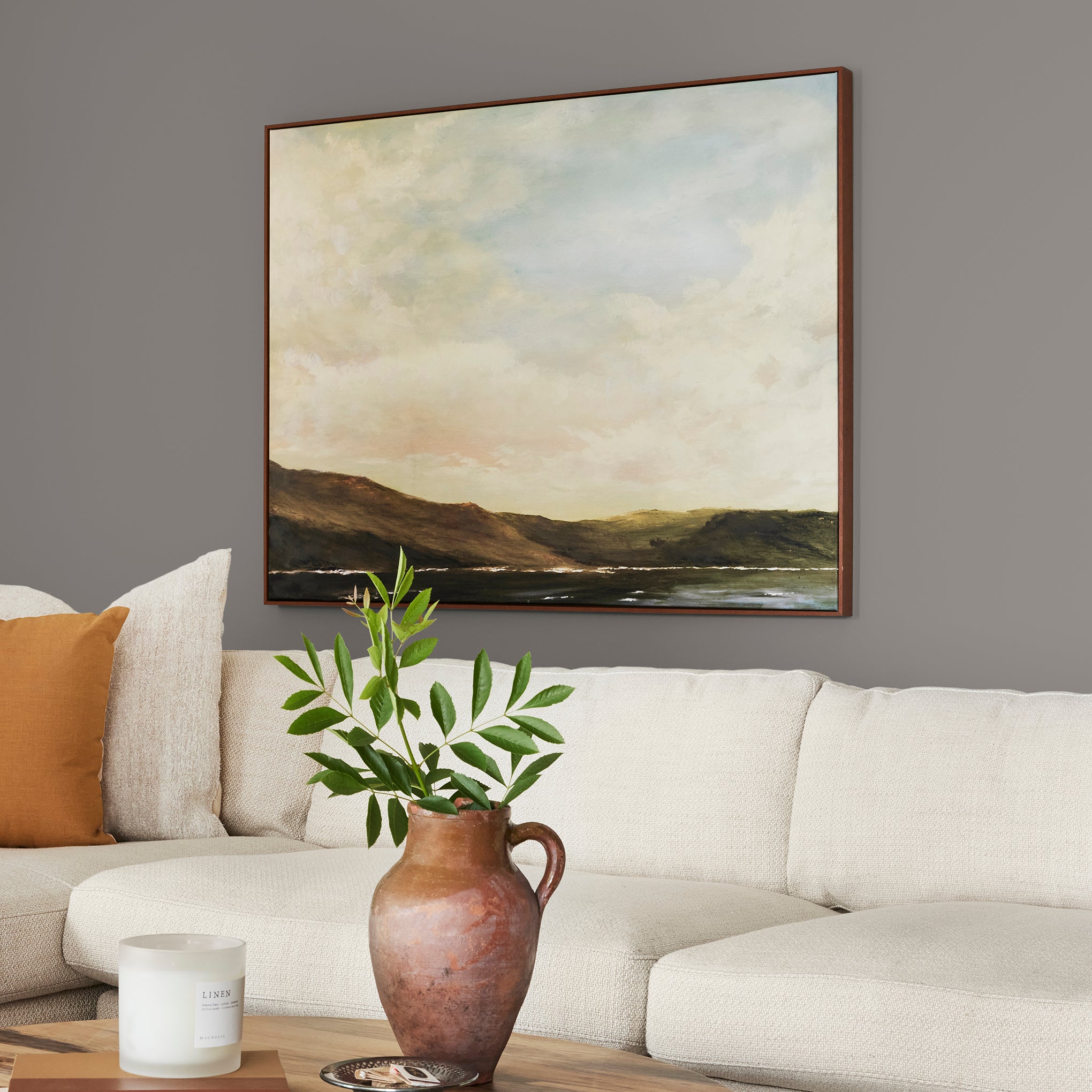 Smoky mid-toned brown interior paint named nesting box shown painted on living room wall