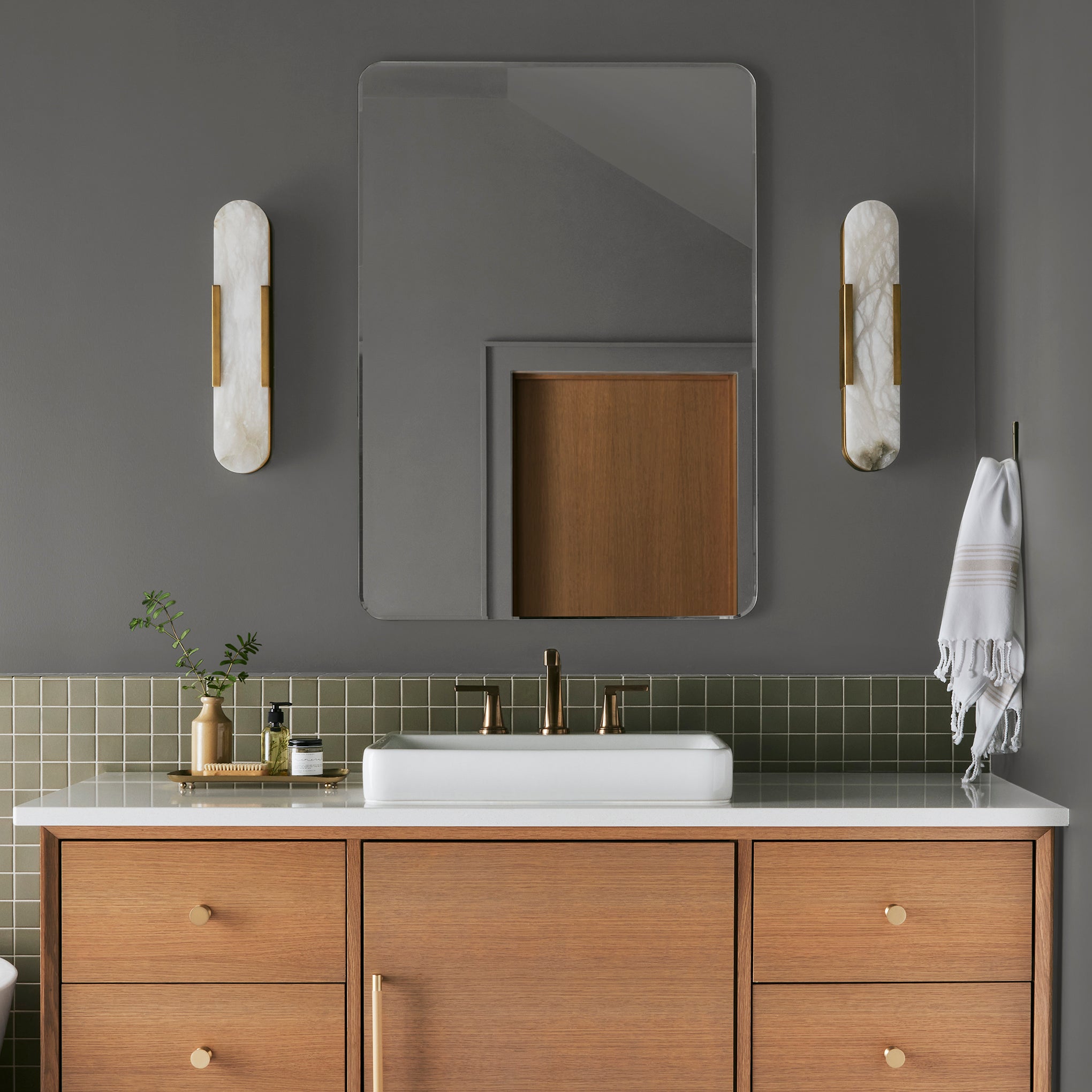 dark grey with brown undertone paint named salvaged shown painted on bathroom wall
