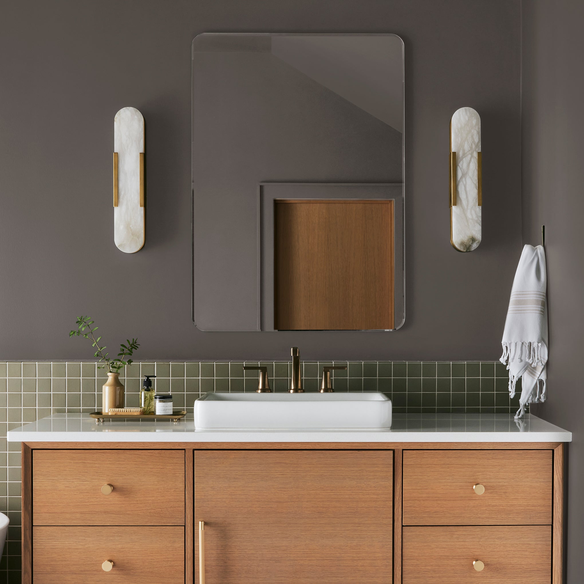 dark cocoa brown paint named cut cedar shown painted on bathroom wall