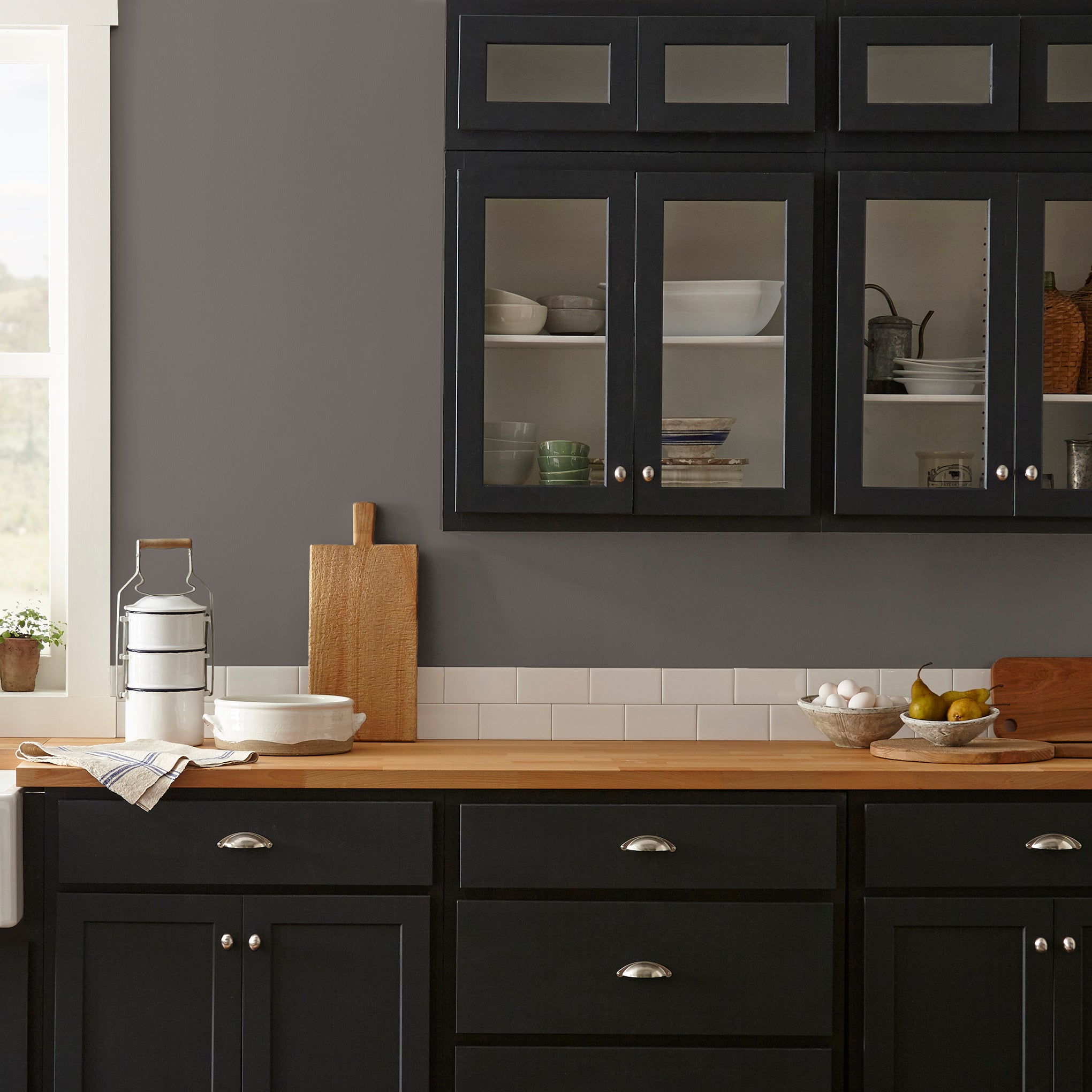 dark cocoa brown paint named cut cedar shown painted on kitchen wall