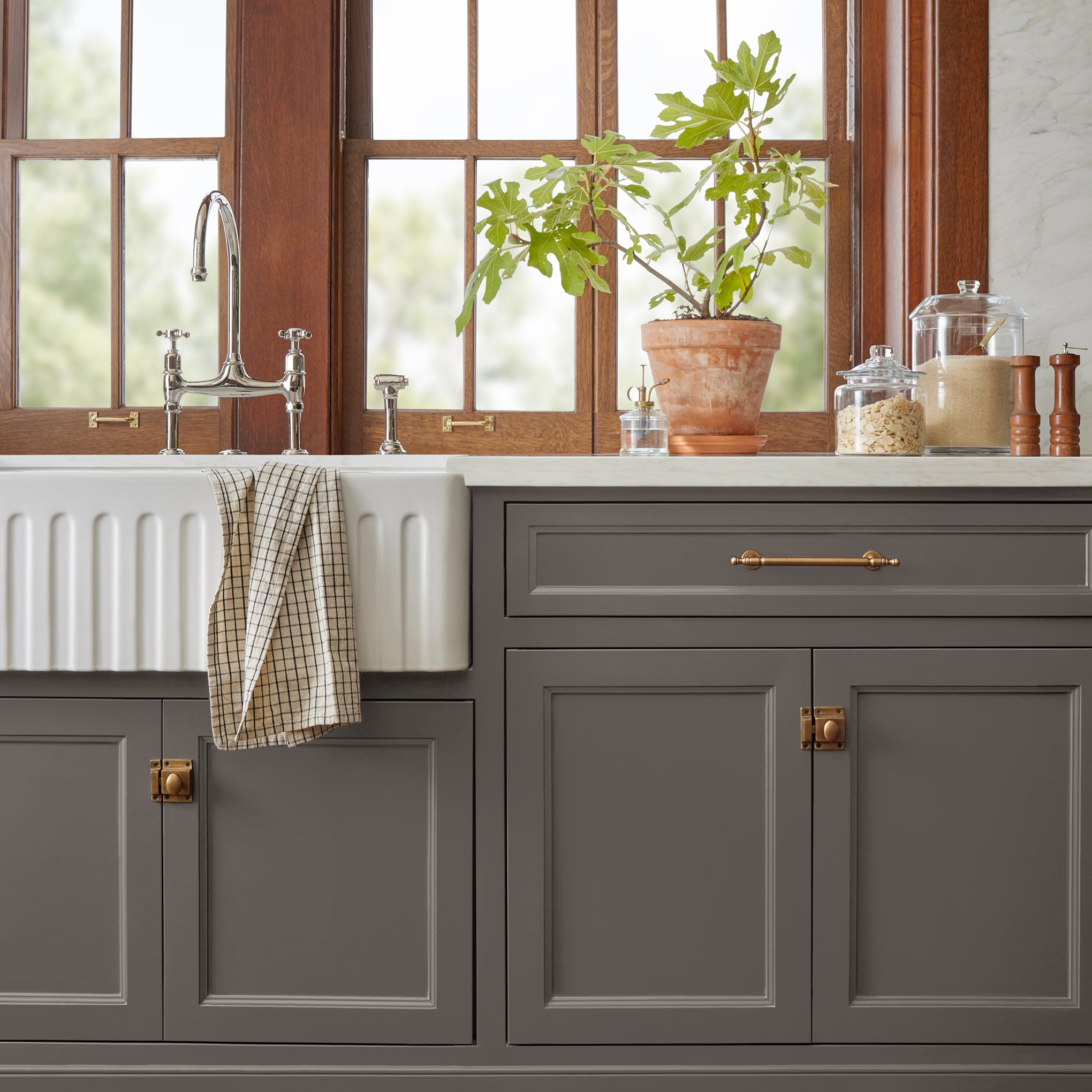 Dark cocoa and cedar brown door and cabinet paint named cut cedar shown painted on kitchen cabinet 