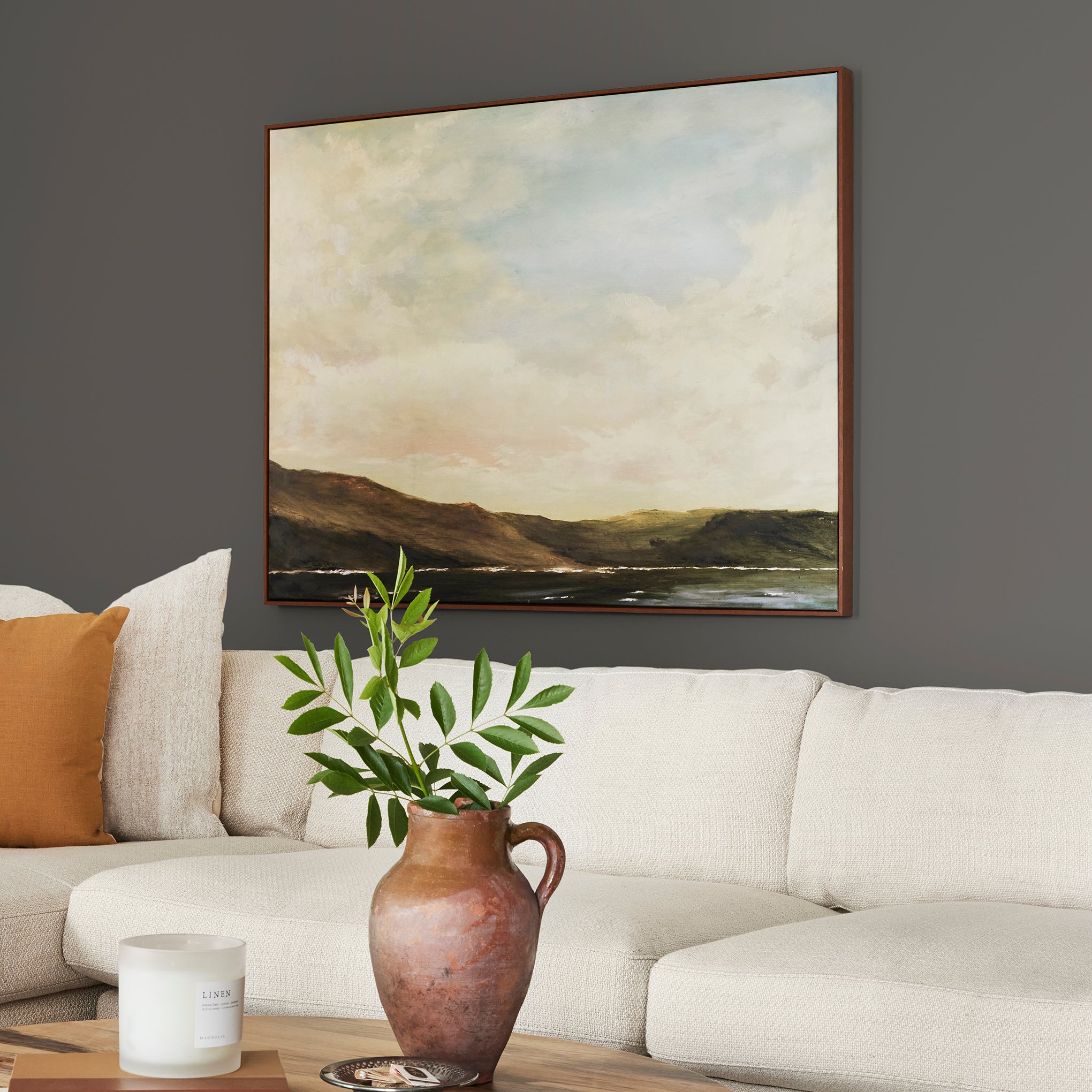 Deep brown with hazel and cocoa notes interior paint named repurpose shown painted on living room wall