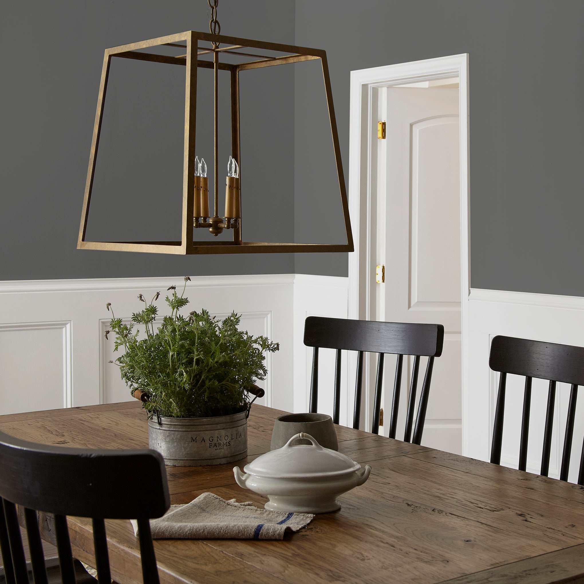 Almost black with green undertones interior paint named prairie smoke shown painted on dining room wall