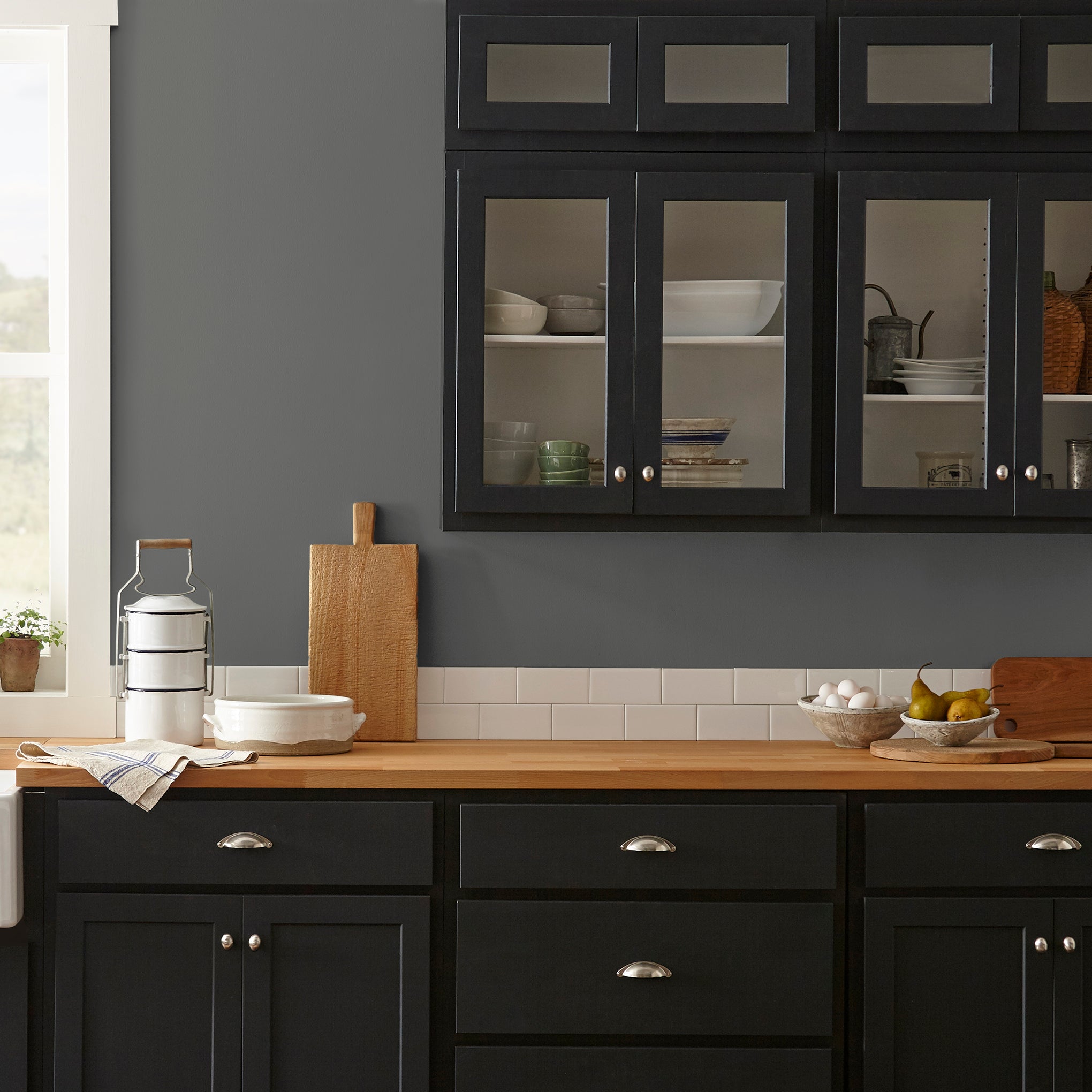 Almost black with green undertones interior paint named prairie smoke shown painted on kitchen wall