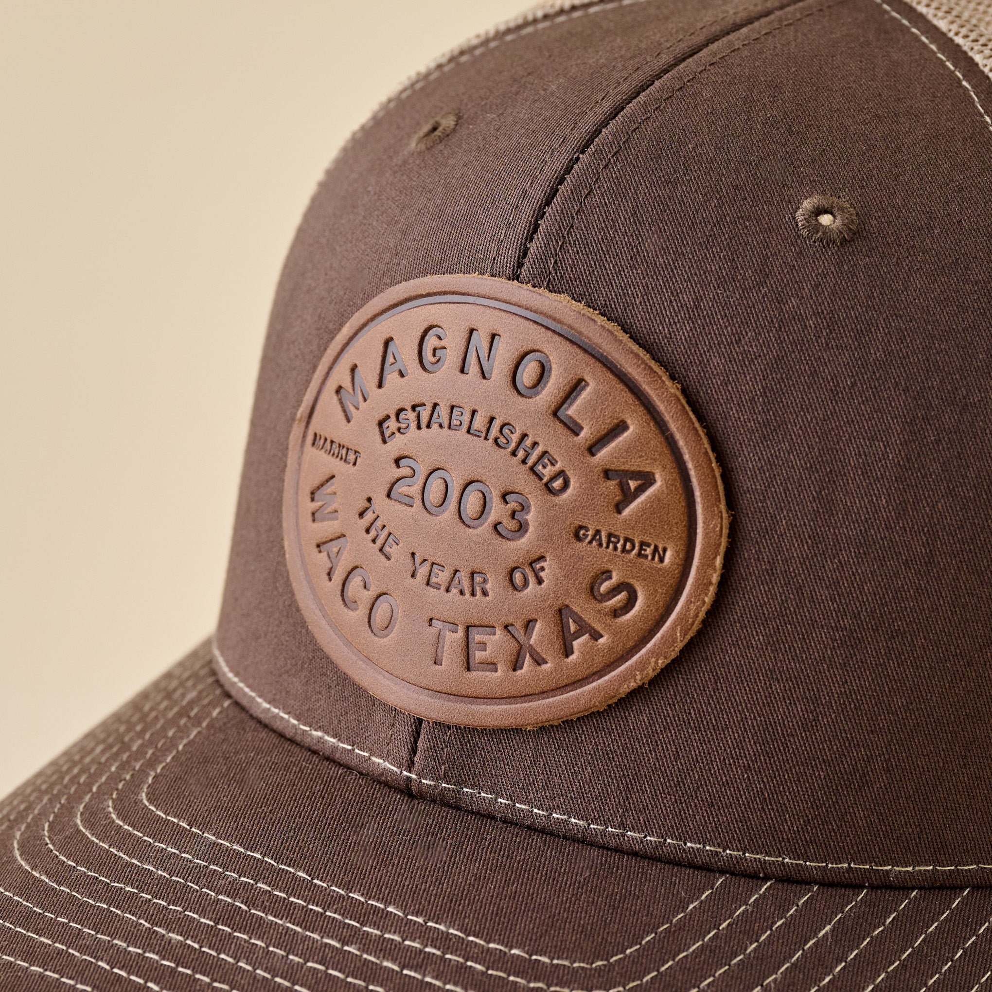 Magnoliass Brown and Khaki Leather Patch Hat up close