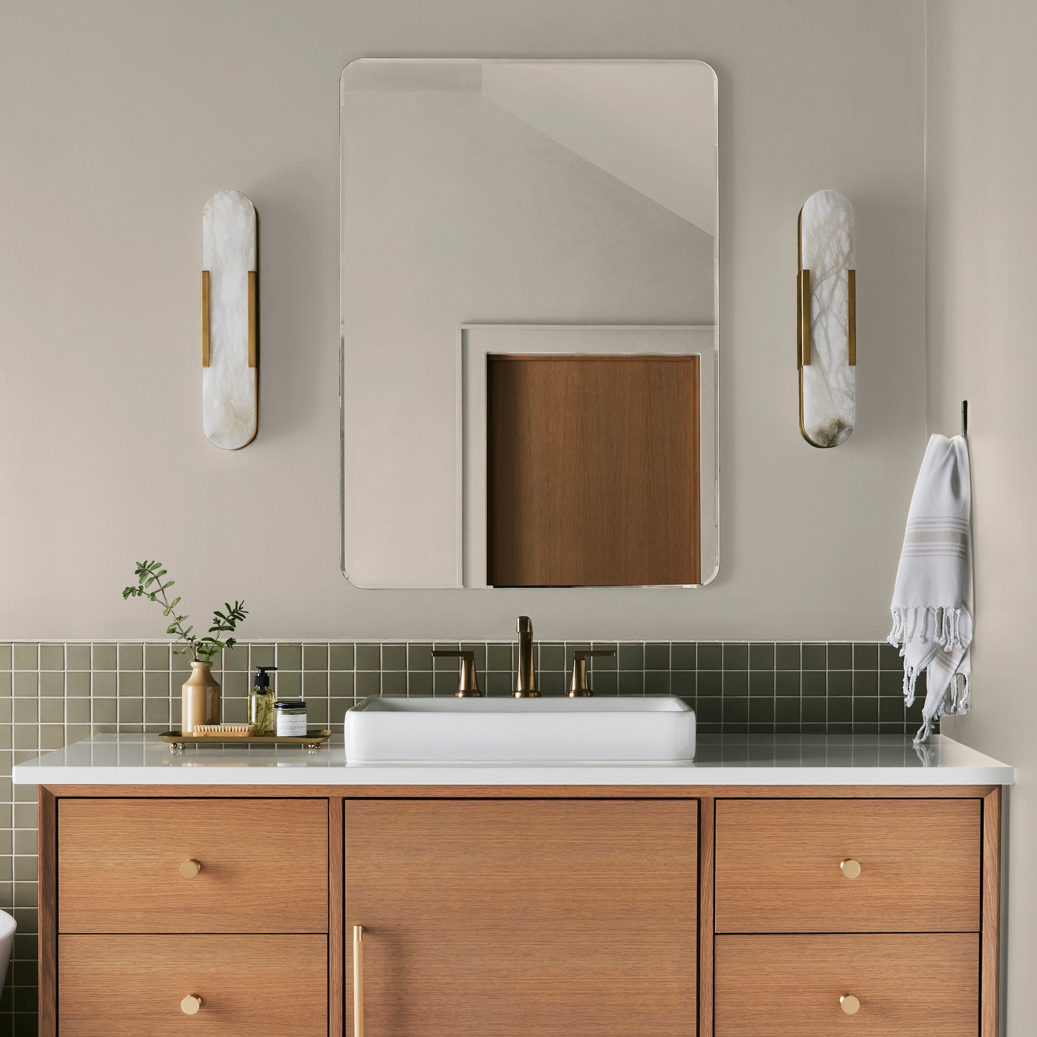 Creamy soft white interior paint named castle cream shown painted on bathroom wall