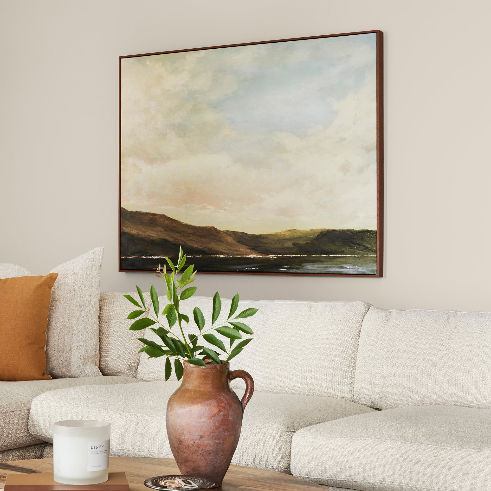 Creamy soft white interior paint named castle cream shown painted on living room wall